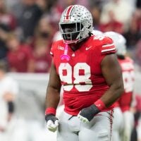 Ohio State Buckeyes defensive tackle Kayden McDonald (98) celebrates during the first half of the Big Ten Conference championship game against the Indiana Hoosiers at Lucas Oil Stadium in Indianapolis on Dec. 6, 2025.