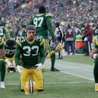 Green Bay Packers safety Evan Williams (33) takes a moment before their game Sunday, December 7, 2025 at Lambeau Field in Green Bay, Wisconsin. The Green Bay Packers beat the Chicago Bears 28-21.