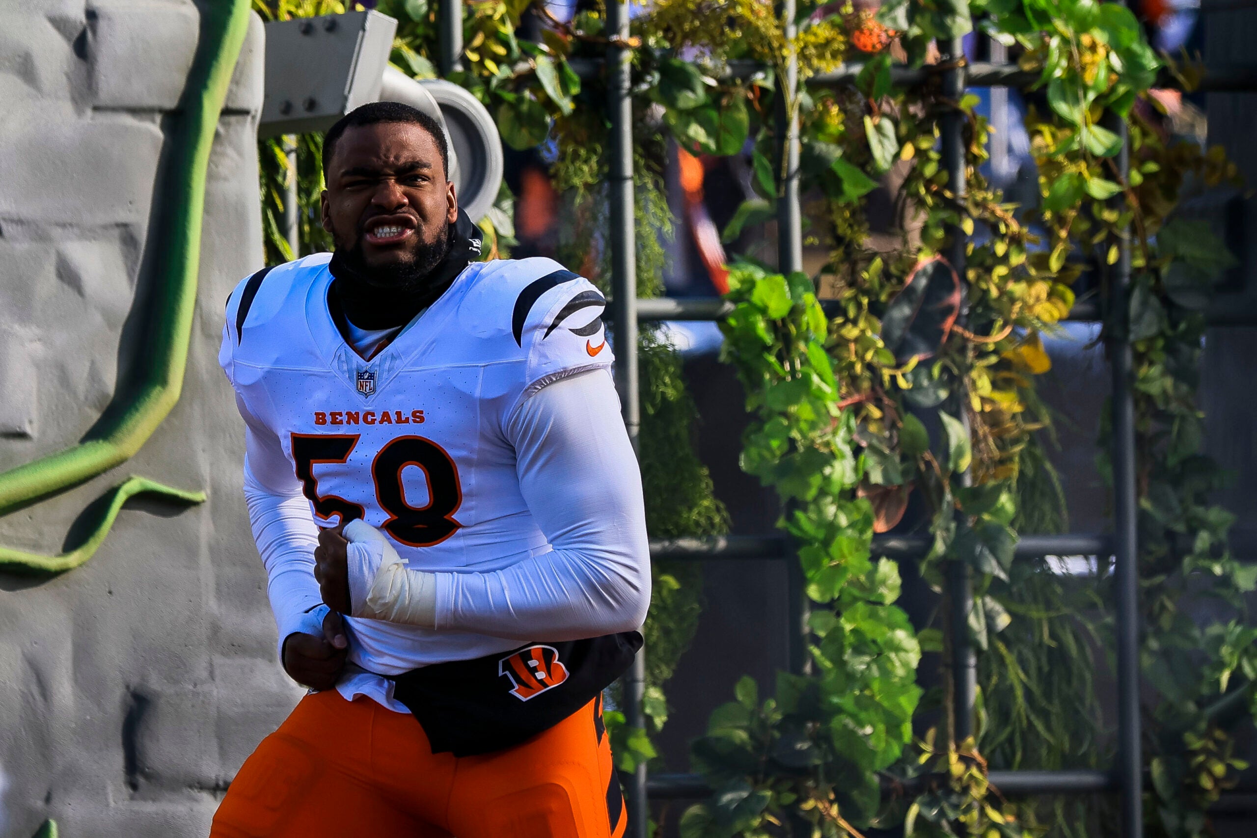 Dec 14, 2025; Cincinnati, Ohio, USA; Cincinnati Bengals defensive end Joseph Ossai (58) runs onto the field before the game against the Baltimore Ravens at Paycor Stadium.