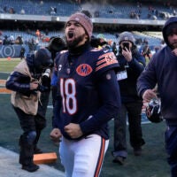 Dec 14, 2025; Chicago, Illinois, USA; Chicago Bears quarterback Caleb Williams (18) celebrates after defeating the Cleveland Browns at Soldier Field.