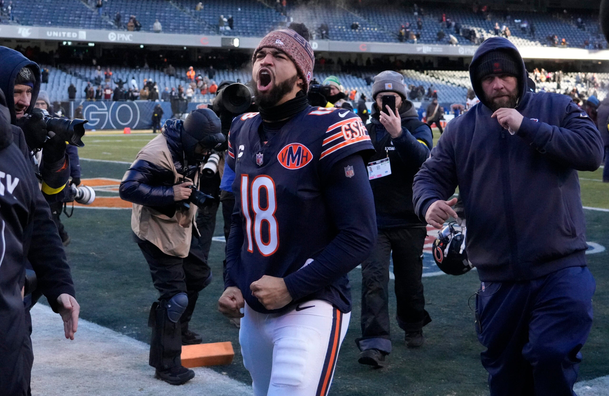 Dec 14, 2025; Chicago, Illinois, USA; Chicago Bears quarterback Caleb Williams (18) celebrates after defeating the Cleveland Browns at Soldier Field.