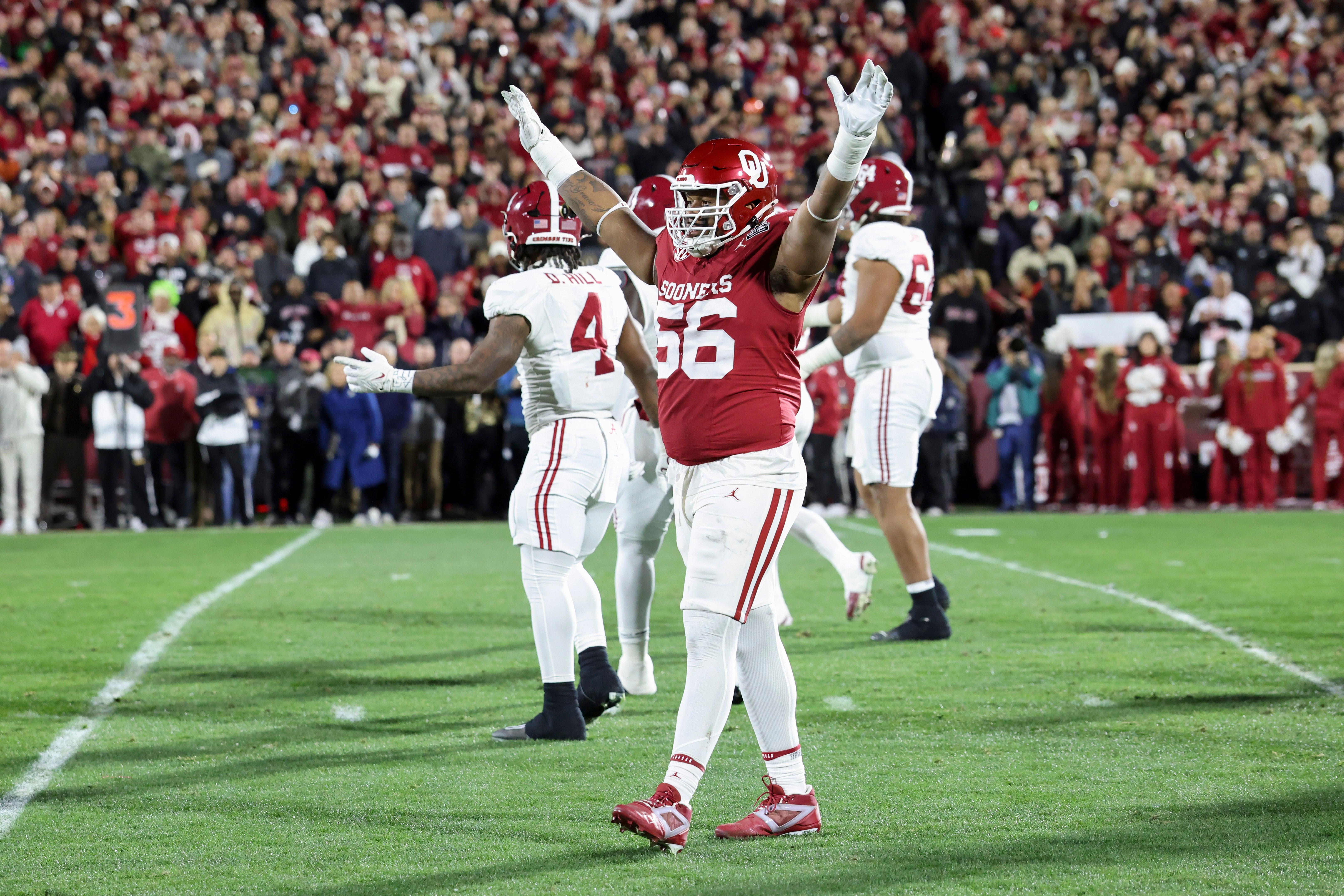 Dec 19, 2025; Norman, OK, USA; Oklahoma Sooners defensive lineman Gracen Halton (56) gestures in the first half against the Alabama Crimson Tide at Gaylord Family OK Memorial Stadium.
