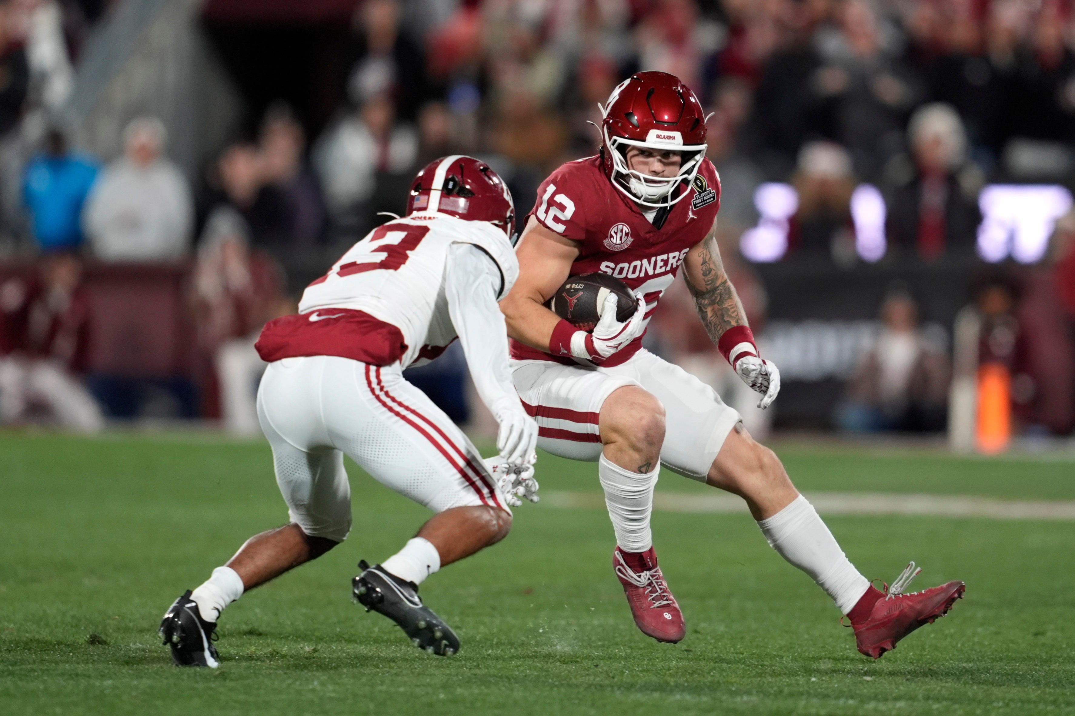 Oklahoma Sooners tight end Jaren Kanak (12) runs after a reception during a first-round College Football Playoff game between the University of Oklahoma Sooners (OU) and the Alabama Crimson Tide at Gaylord Family – Oklahoma Memorial Stadium in Norman, Okla., Friday, Dec. 19, 2025. Alabama won 34-24.