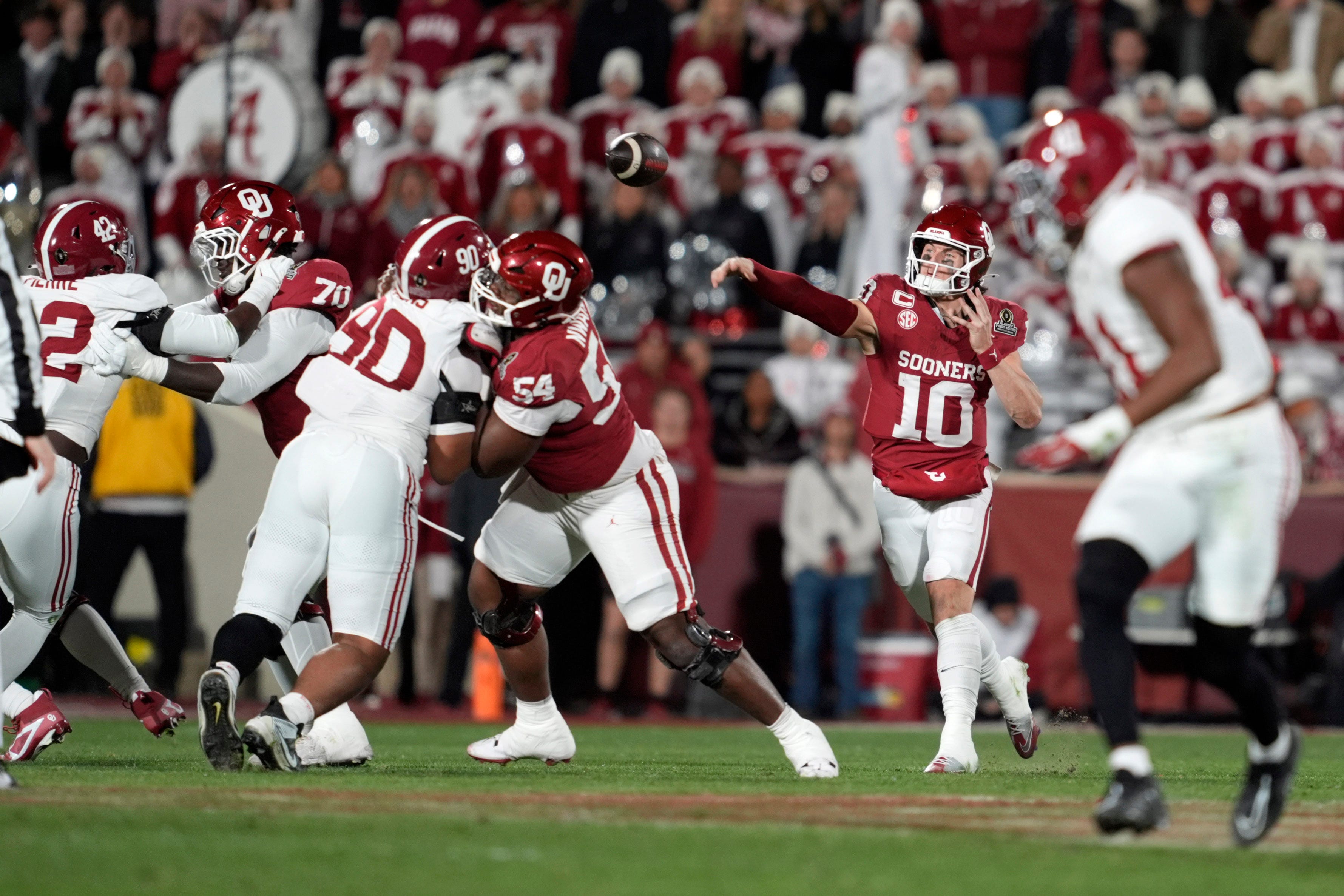 Oklahoma Sooners quarterback John Mateer (10) throws a pass during a first-round College Football Playoff game between the University of Oklahoma Sooners (OU) and the Alabama Crimson Tide at Gaylord Family - Oklahoma Memorial Stadium in Norman, Okla., Friday, Dec. 19, 2025. Alabama won 34-24.