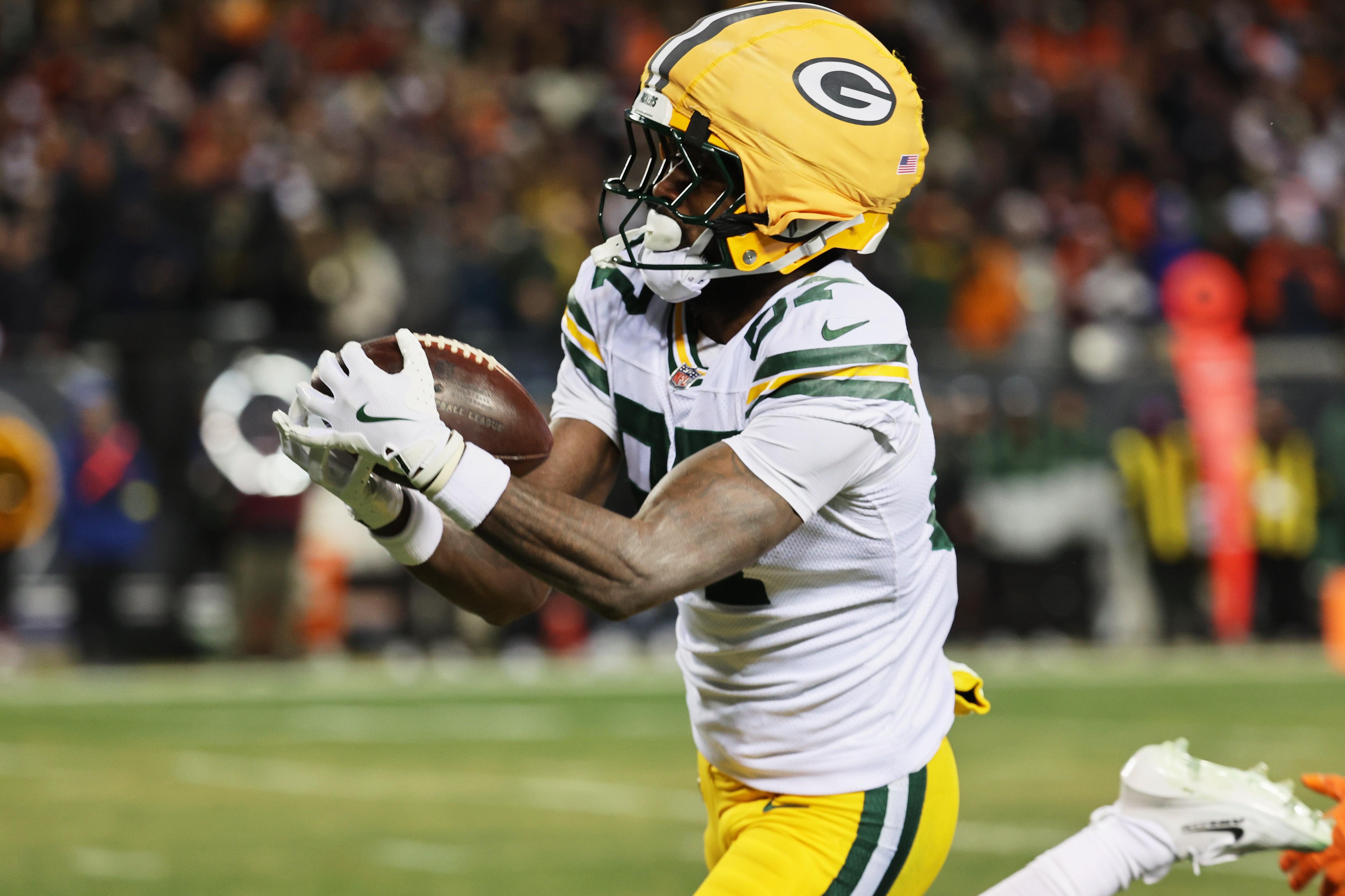 Dec 20, 2025; Chicago, Illinois, USA; Green Bay Packers wide receiver Romeo Doubs (87) catches a thirty-three yard touchdown pass thrown by quarterback Malik Willis (not pictured) against the Chicago Bears during the third quarter at Soldier Field.
