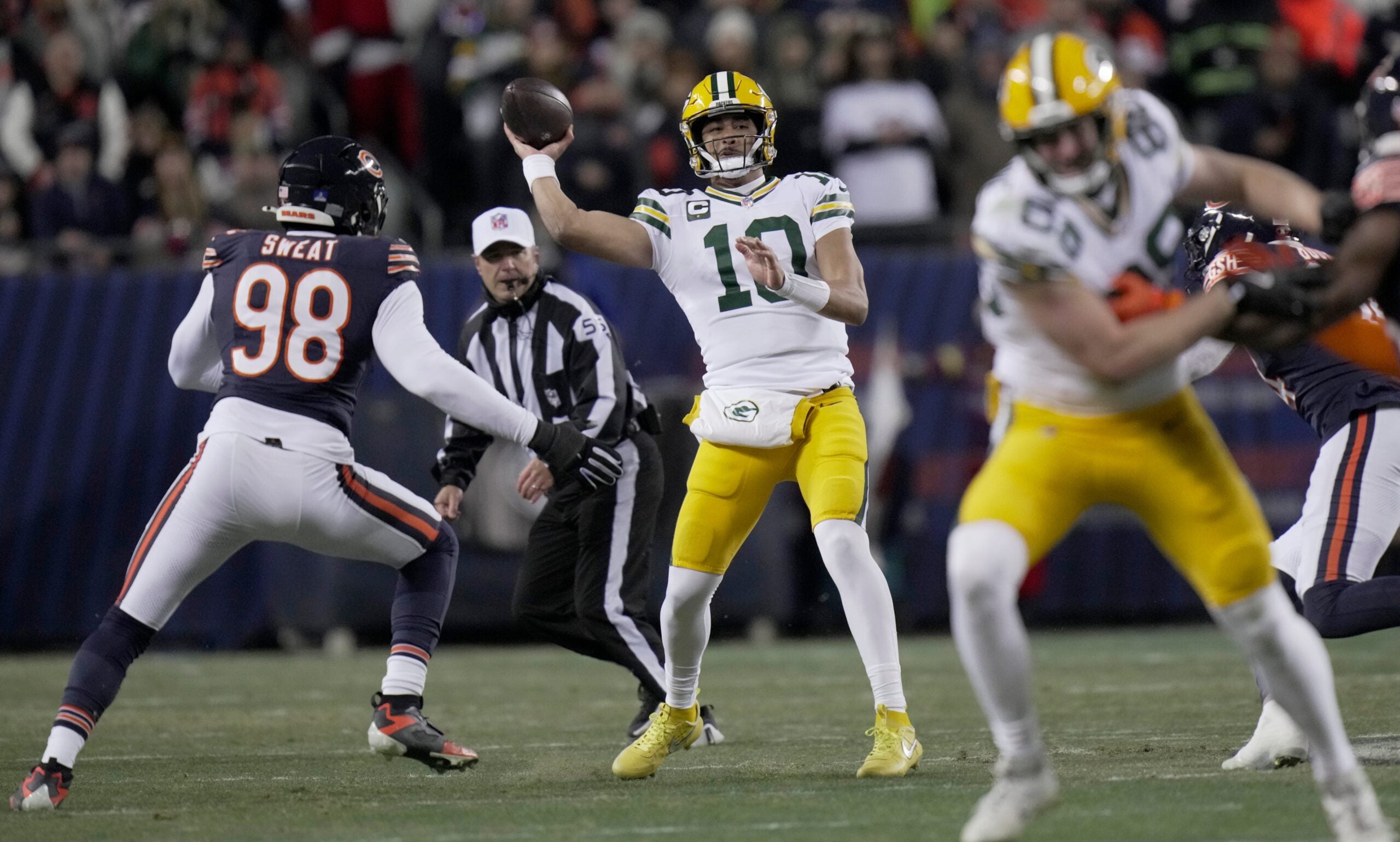 Green Bay Packers quarterback Jordan Love (10) throws downfield during the first quarter of their game against the Chicago Bears Saturday, December 20, 2025 at Soldier Field in Chicago, Illinois.