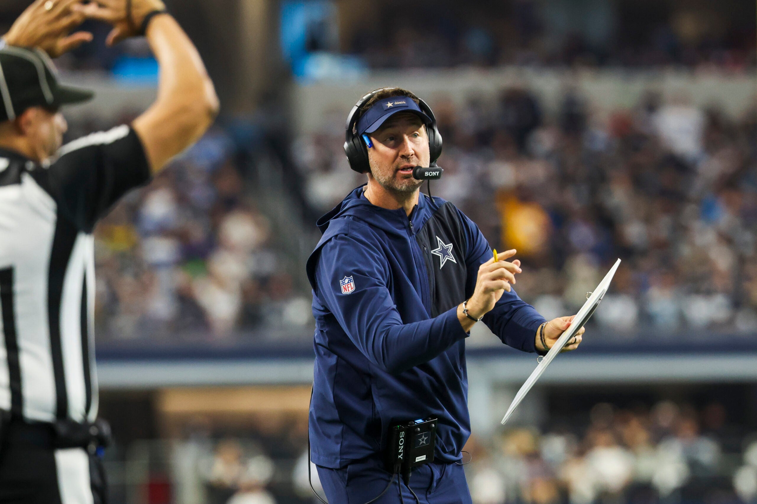 Dec 21, 2025; Arlington, Texas, USA; Dallas Cowboys head coach Brian Schottenheimer reacts to a play against the Los Angeles Chargers during the second quarter at AT&T Stadium.