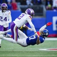 Minnesota Vikings cornerback Isaiah Rodgers (2) breaks up a pass to New York Giants wide receiver Wan'Dale Robinson (17) during a game at MetLife Stadium, Dec 21, 2025, East Rutherford, NJ, USA