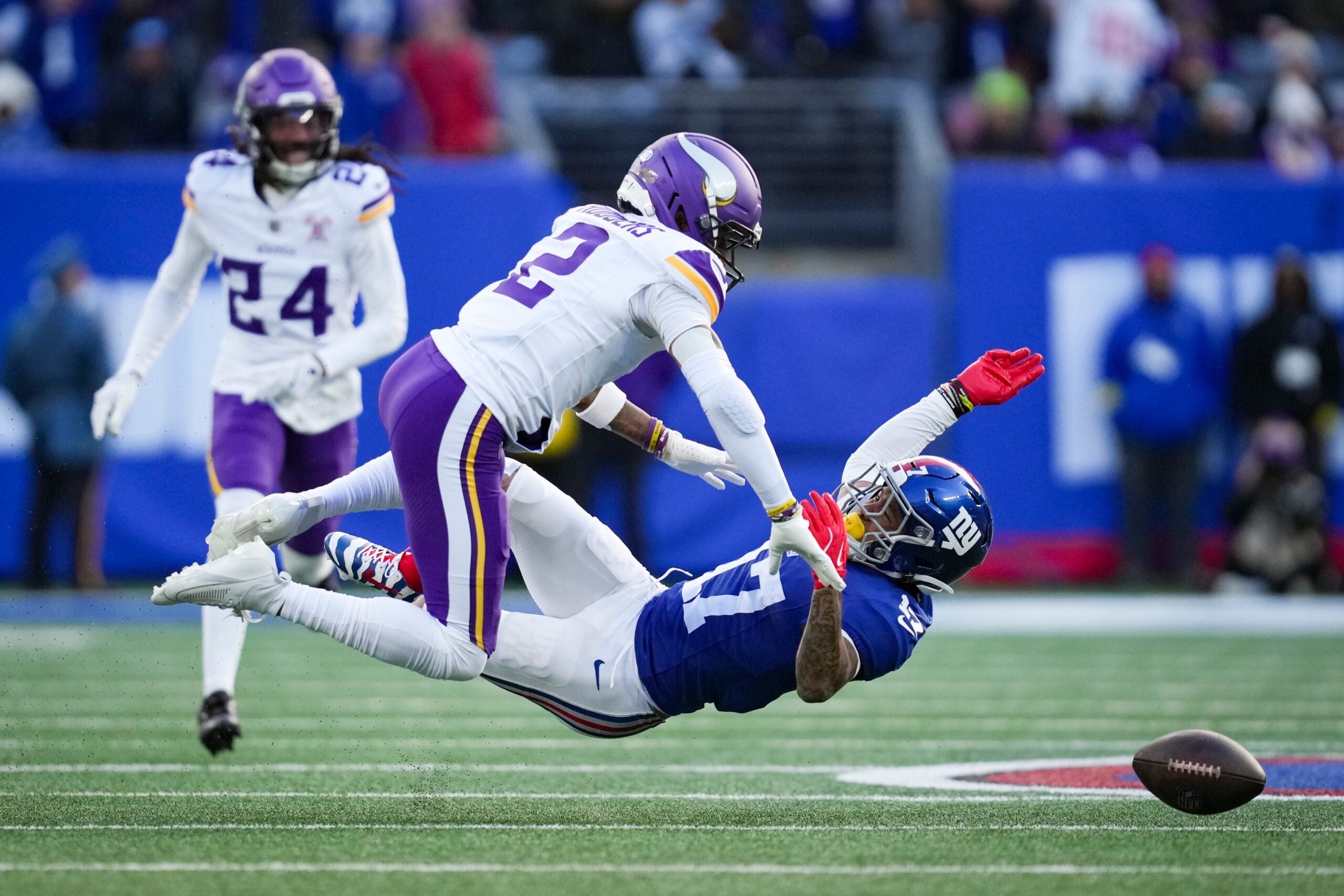 Minnesota Vikings cornerback Isaiah Rodgers (2) breaks up a pass to New York Giants wide receiver Wan'Dale Robinson (17) during a game at MetLife Stadium, Dec 21, 2025, East Rutherford, NJ, USA