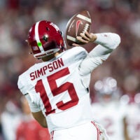 Dec 19, 2025; Norman, OK, USA; Detailed view of the jersey of Alabama Crimson Tide quarterback Ty Simpson (15) against the Oklahoma Sooners during the CFP National Playoff First Round at Gaylord Family Oklahoma Memorial Stadium