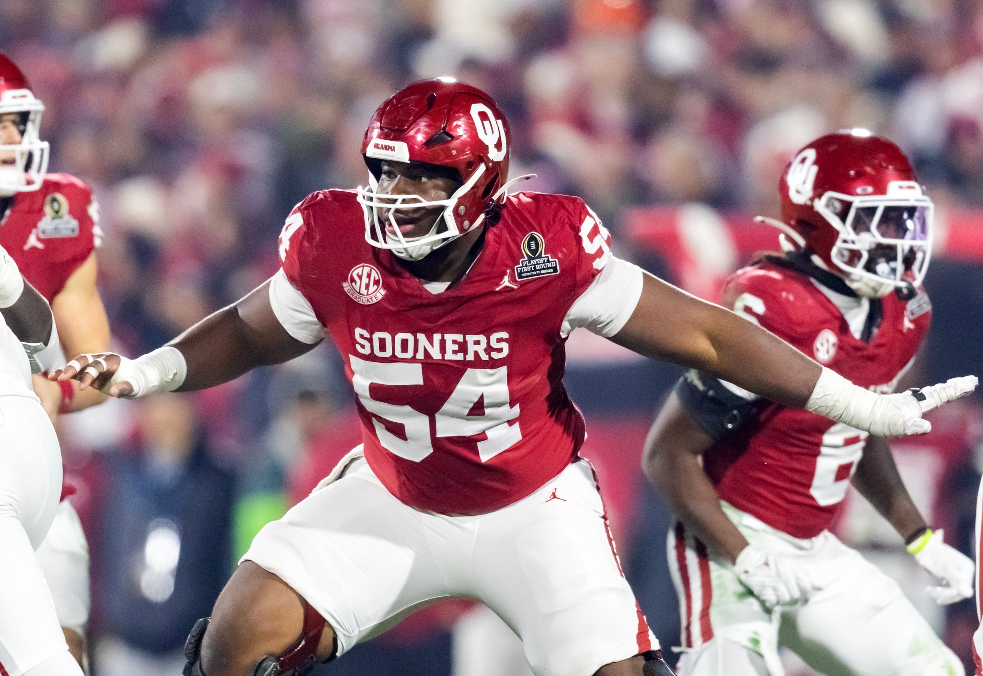 Dec 19, 2025; Norman, OK, USA; Oklahoma Sooners offensive lineman Febechi Nwaiwu (54) against the Alabama Crimson Tide during the CFP National Playoff First Round at Gaylord Family Oklahoma Memorial Stadium.