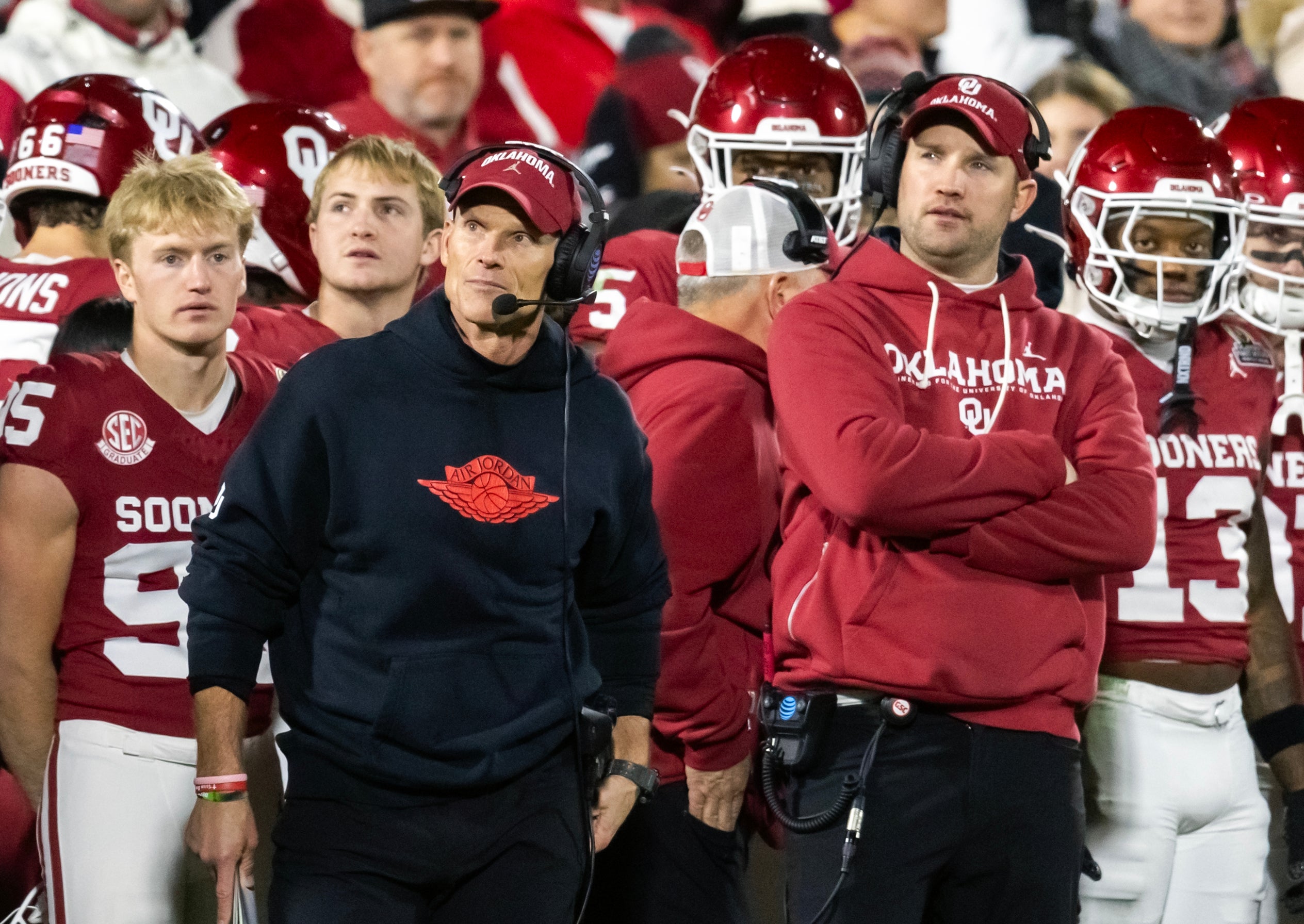 Dec 19, 2025; Norman, OK, USA; Oklahoma Sooners head coach Brent Venables (left) and inside linebackers coach Nate Dreiling against the Alabama Crimson Tide during the CFP National Playoff First Round at Gaylord Family Oklahoma Memorial Stadium.