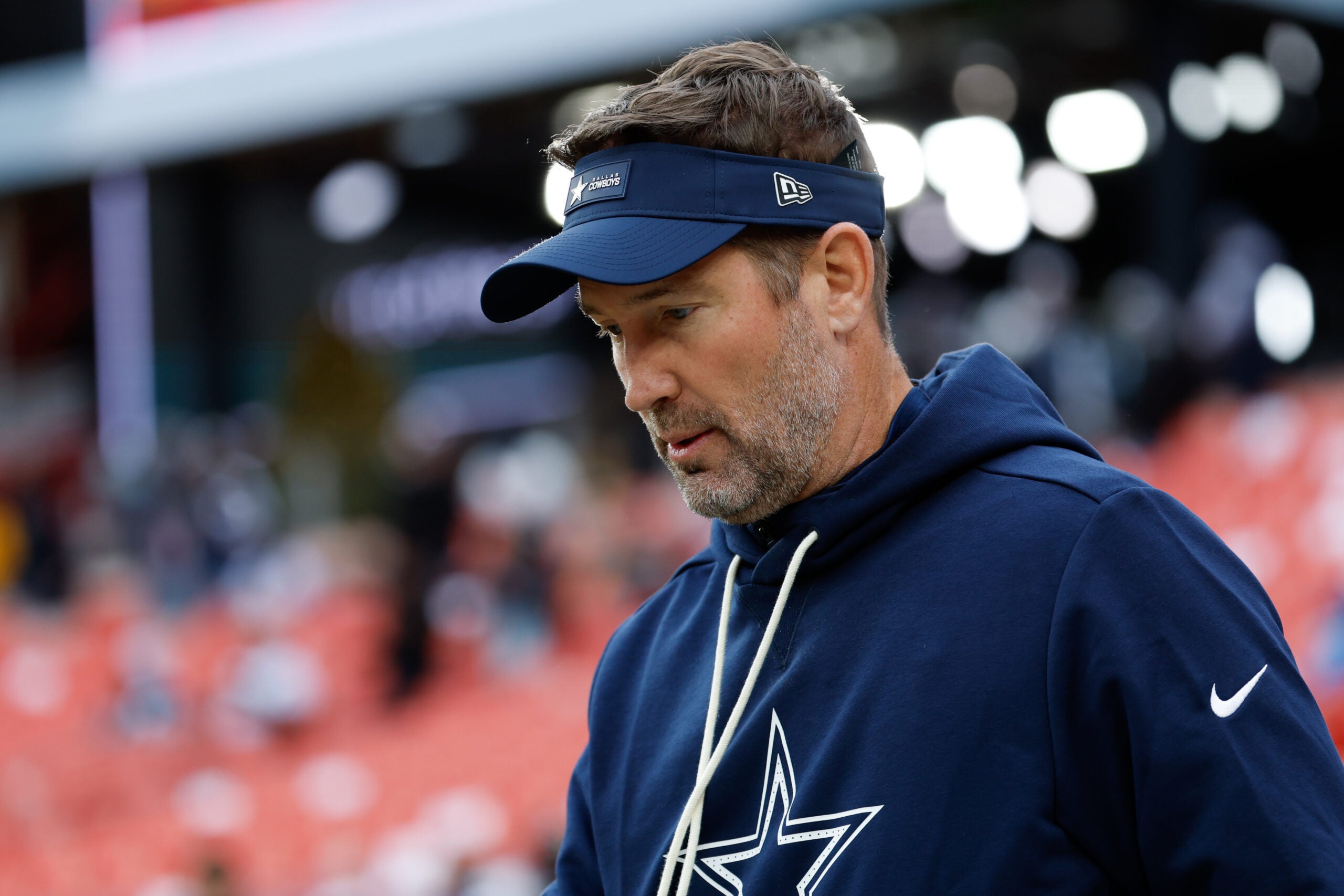 Dec 25, 2025; Landover, Maryland, USA; Dallas Cowboys head coach Brian Schottenheimer looks on during warmups before the game against the Washington Commanders at Northwest Stadium.