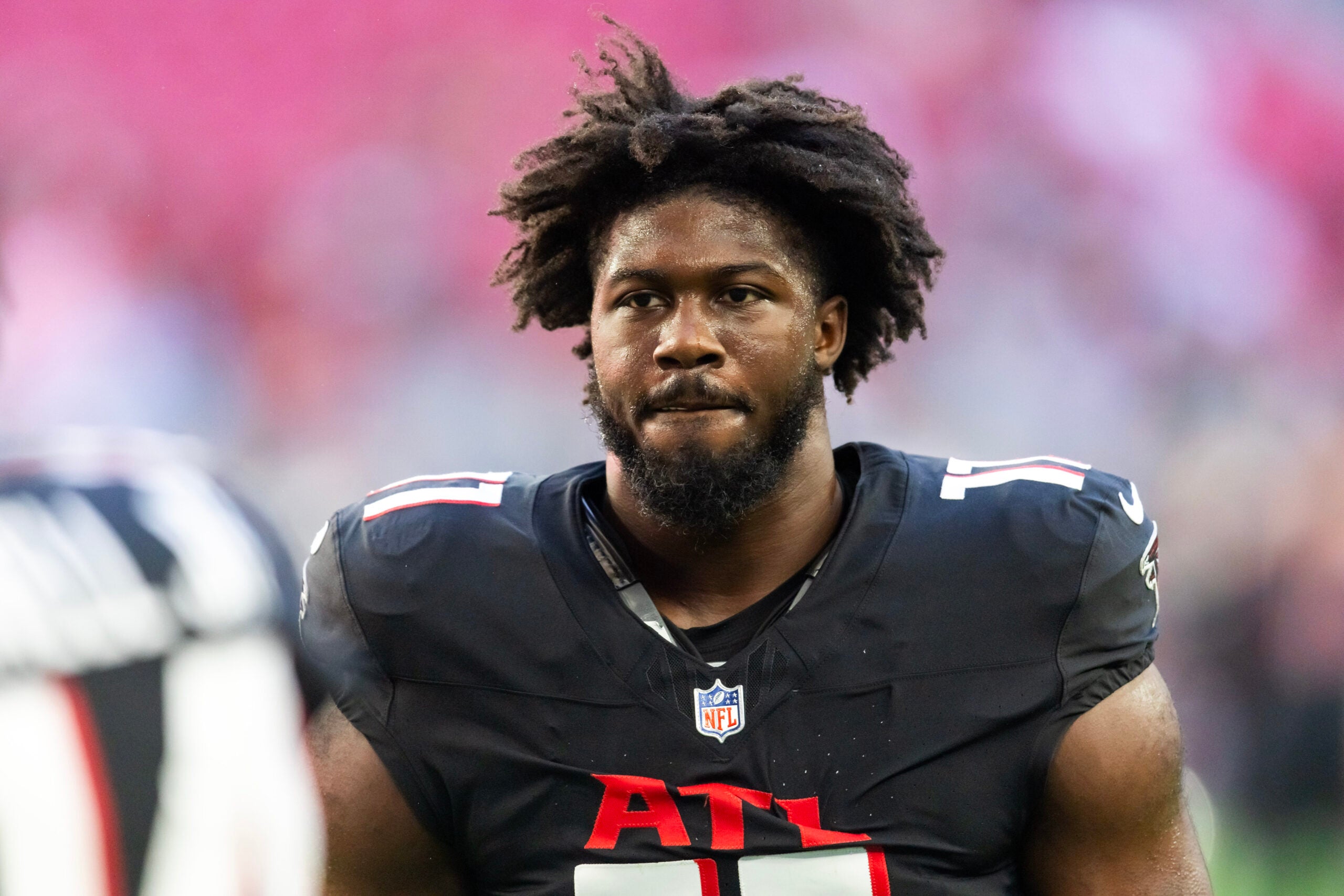 Dec 21, 2025; Glendale, Arizona, USA; Atlanta Falcons linebacker Jalon Walker (11) against the Arizona Cardinals at State Farm Stadium.