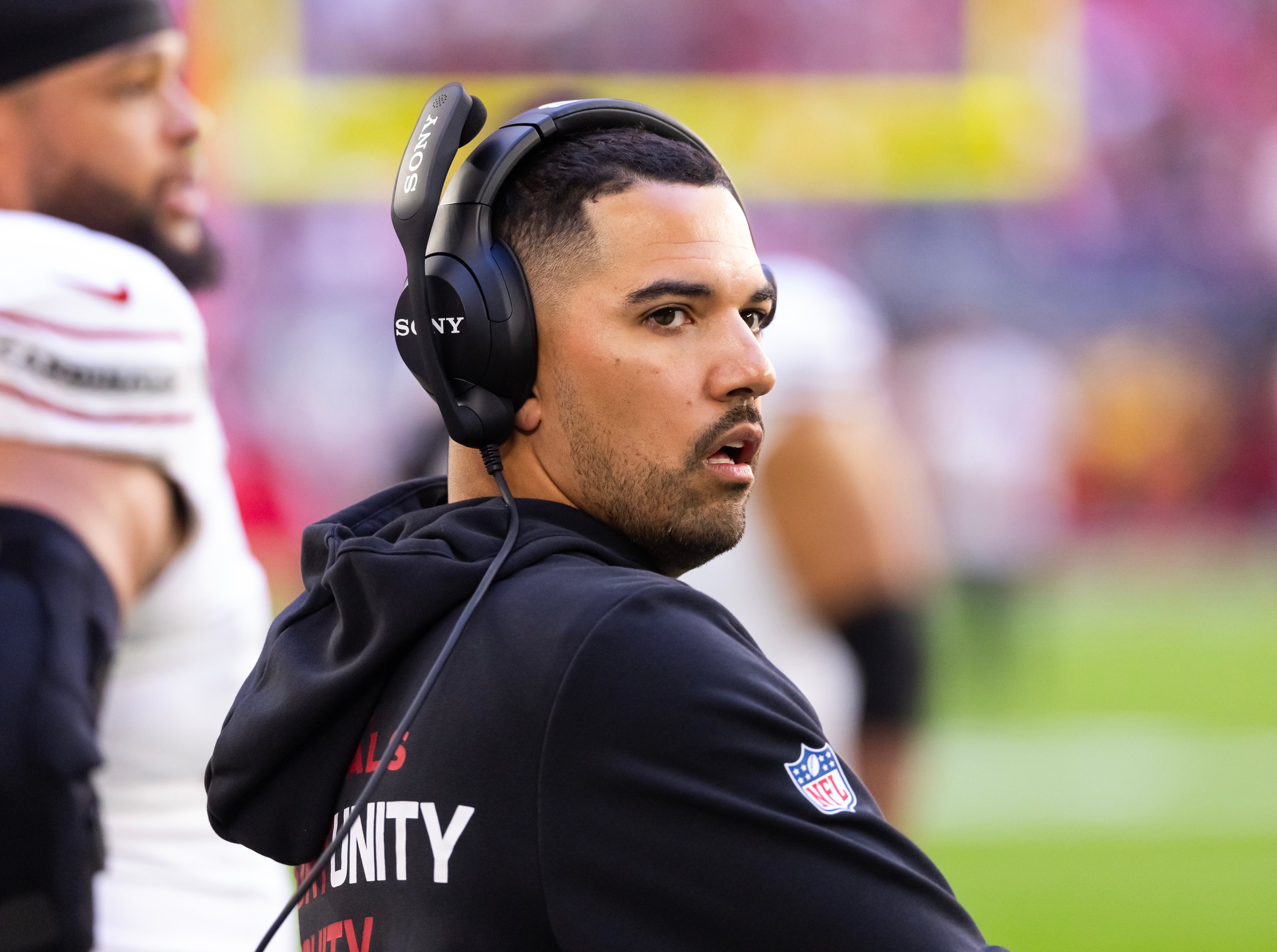 Dec 21, 2025; Glendale, Arizona, USA; Arizona Cardinals cornerbacks coach Ryan Smith against the Atlanta Falcons at State Farm Stadium.