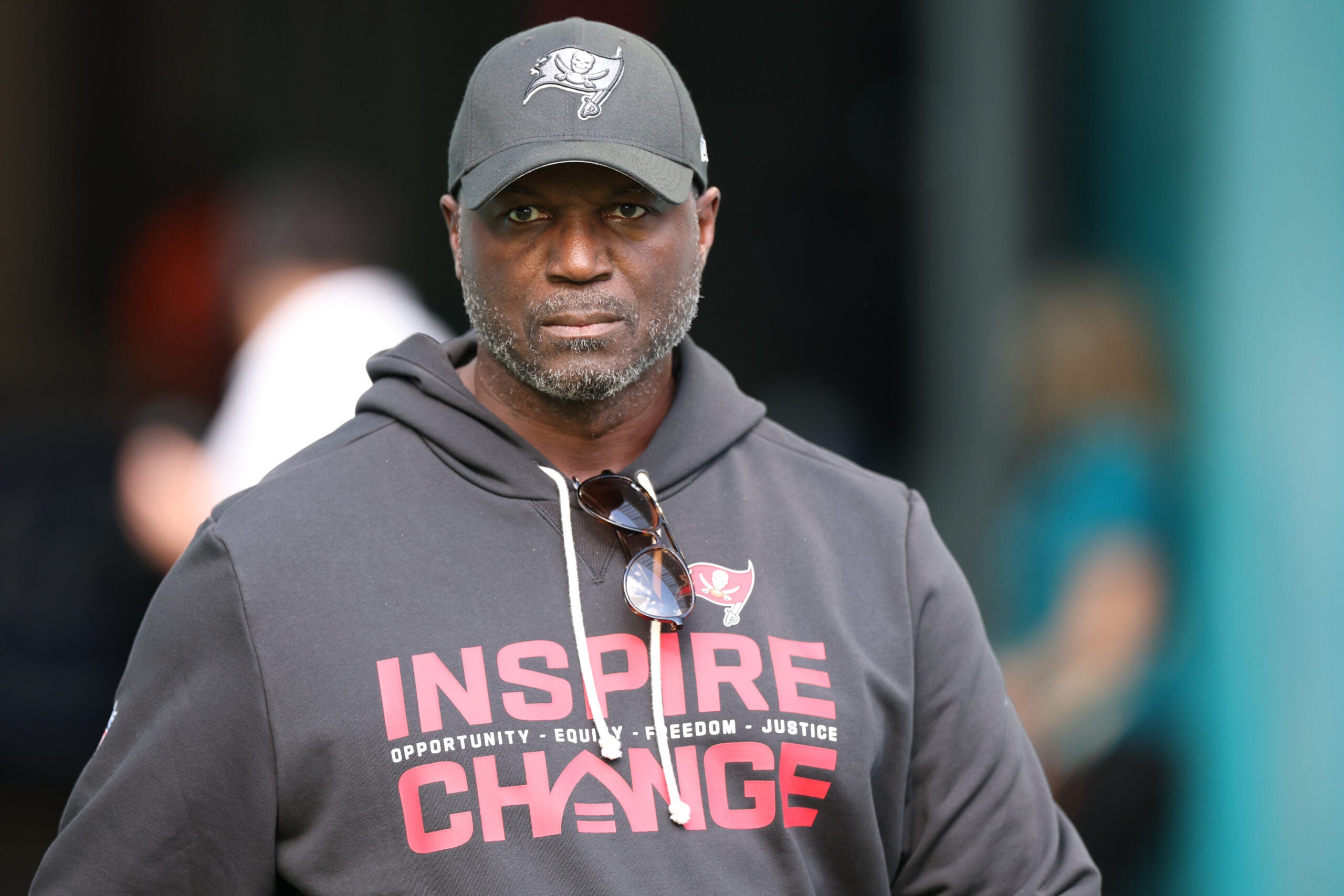 Dec 28, 2025; Miami Gardens, Florida, USA; Tampa Bay Buccaneers head coach Todd Bowles walks around the field during warmups prior to a game against the Miami Dolphins at Hard Rock Stadium.