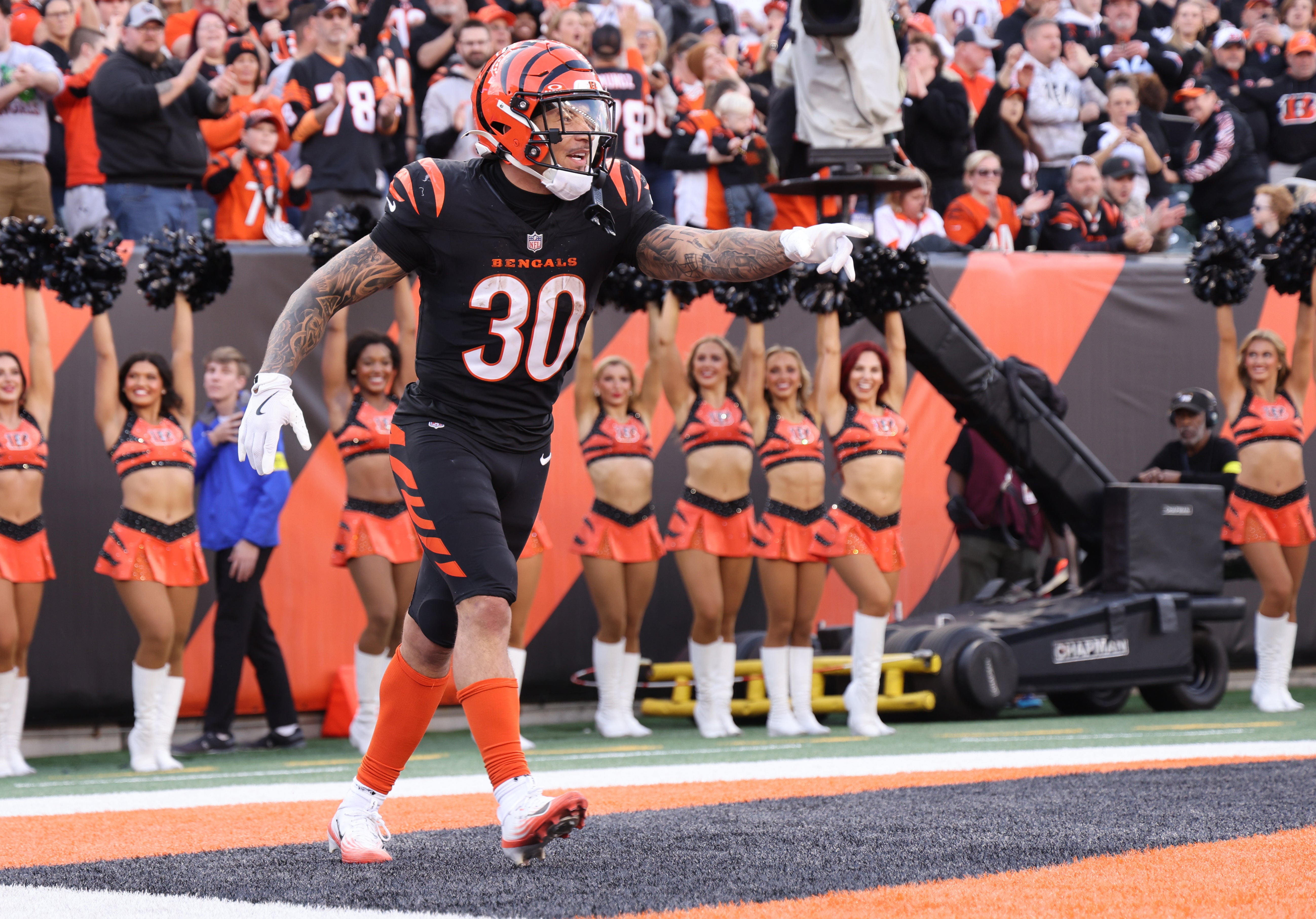 Dec 28, 2025; Cincinnati, Ohio, USA; Cincinnati Bengals running back Chase Brown (30) reacts after scoring a touchdown during the second half against the Arizona Cardinals at Paycor Stadium.