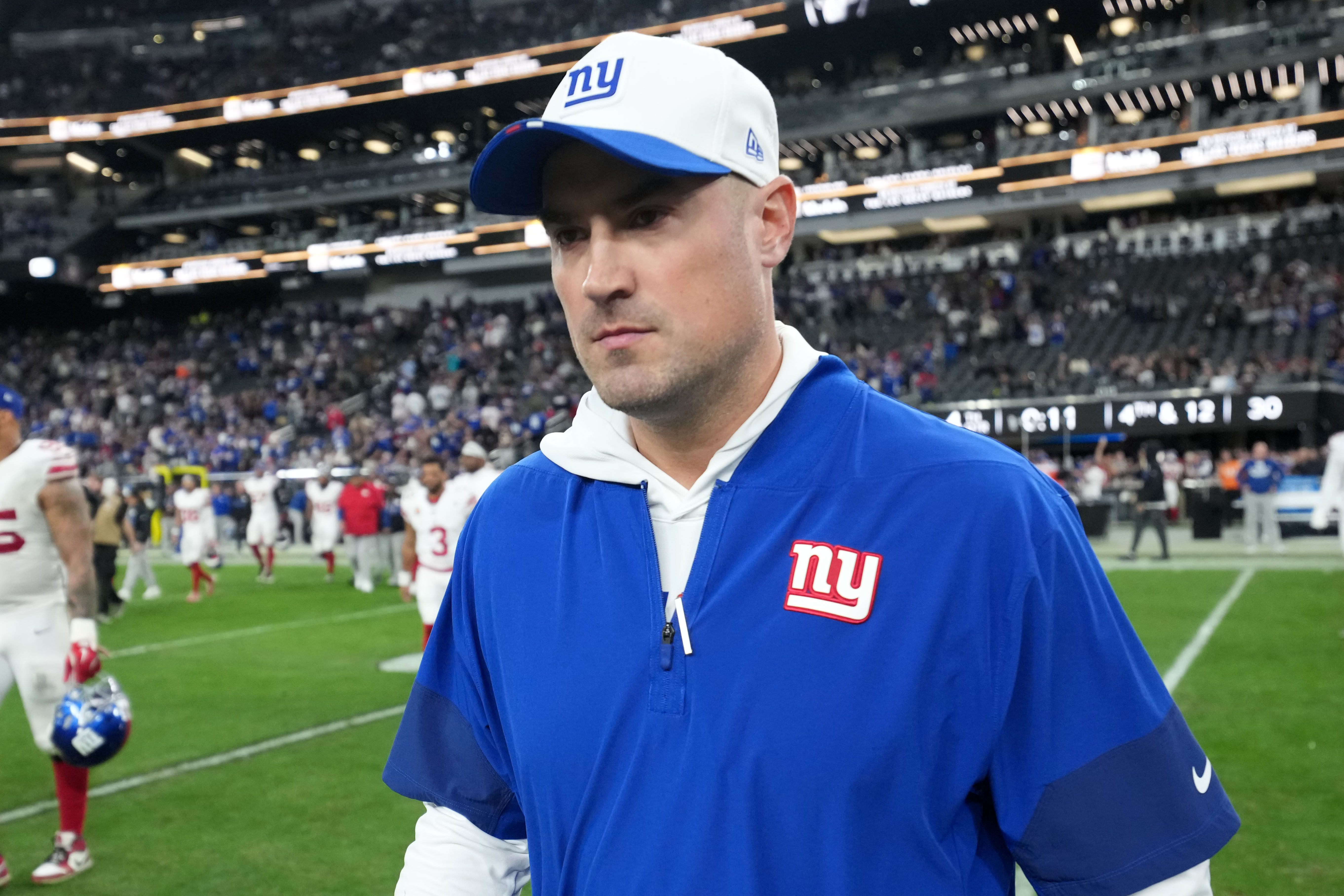 Dec 28, 2025; Paradise, Nevada, USA; New York Giants head coach Mike Kafka leaves the field after the game against the Las Vegas Raiders at Allegiant Stadium.