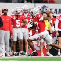 Ohio State Buckeyes wide receiver Carnell Tate (17) runs after a catch during the Cotton Bowl at AT&T Stadium in Arlington, Texas for the College Football Playoff quarterfinal game against the Miami Hurricanes on Dec. 31, 2025. Ohio State lost 24-14.