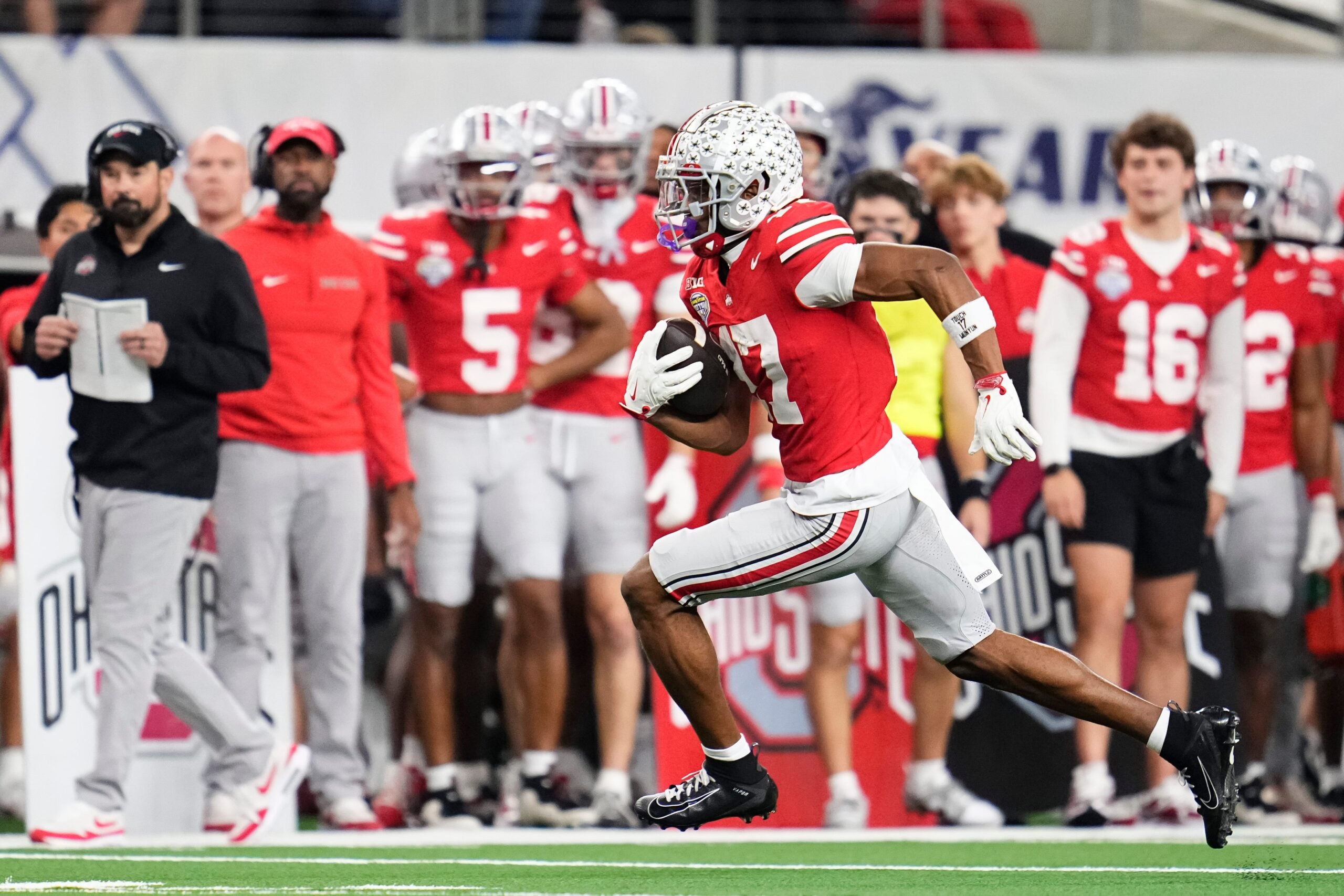 Ohio State Buckeyes wide receiver Carnell Tate (17) runs after a catch during the Cotton Bowl at AT&T Stadium in Arlington, Texas for the College Football Playoff quarterfinal game against the Miami Hurricanes on Dec. 31, 2025. Ohio State lost 24-14.