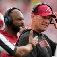 Alabama Crimson Tide head coach Kalen Deboer talks on the sideline Thursday, Jan. 1, 2026, during the Rose Bowl and quarterfinal game of the College Football Playoff against Indiana Hoosiers at Rose Bowl Stadium in Pasadena, Calif.