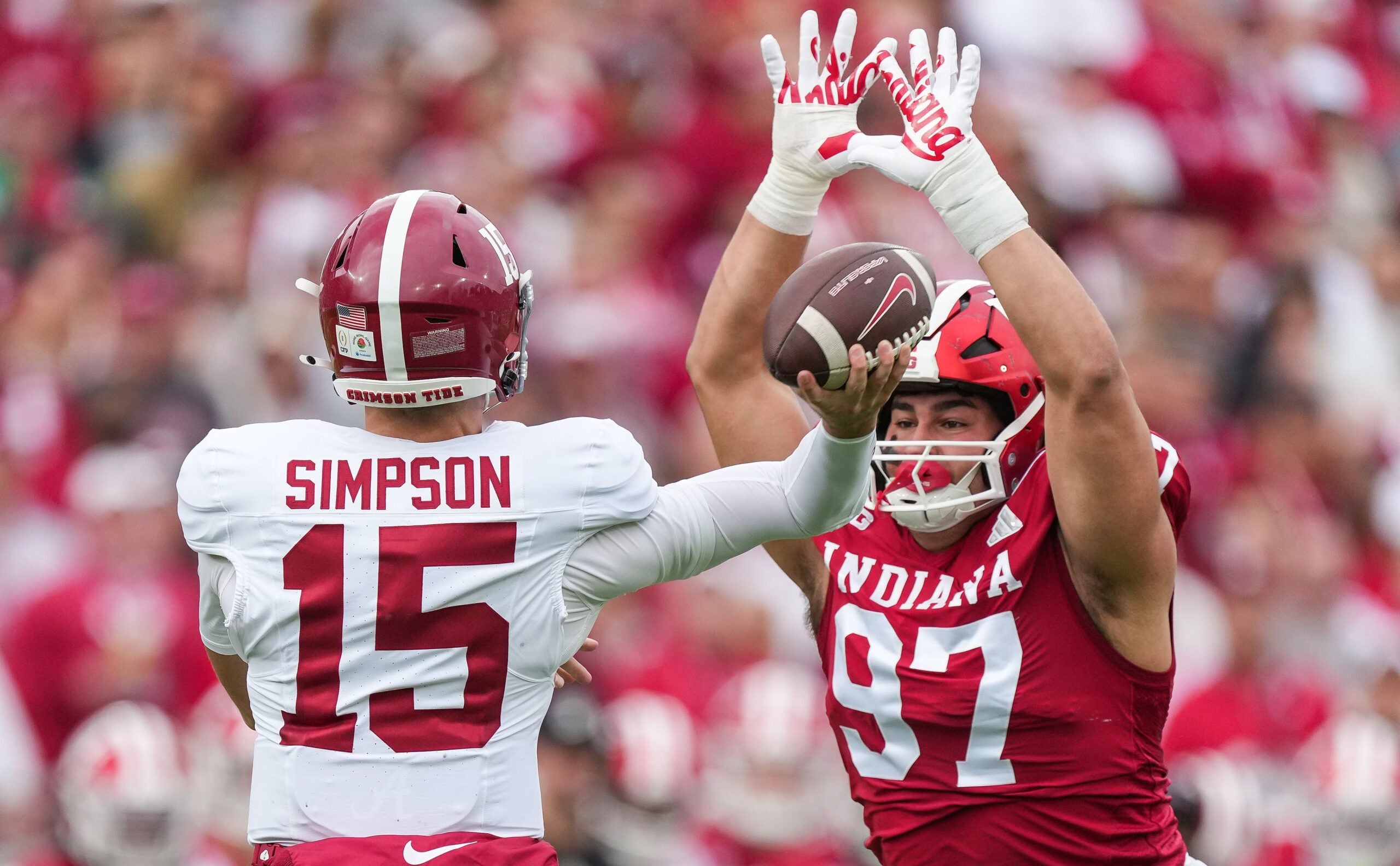 Alabama Crimson Tide quarterback Ty Simpson (15) throws the ball against Indiana Hoosiers defensive lineman Mario Landino (97) on Thursday, Jan. 1, 2026, during the 112th annual Rose Bowl game in Pasadena. Indiana Hoosiers defeated Alabama Crimson Tide, 38-3.