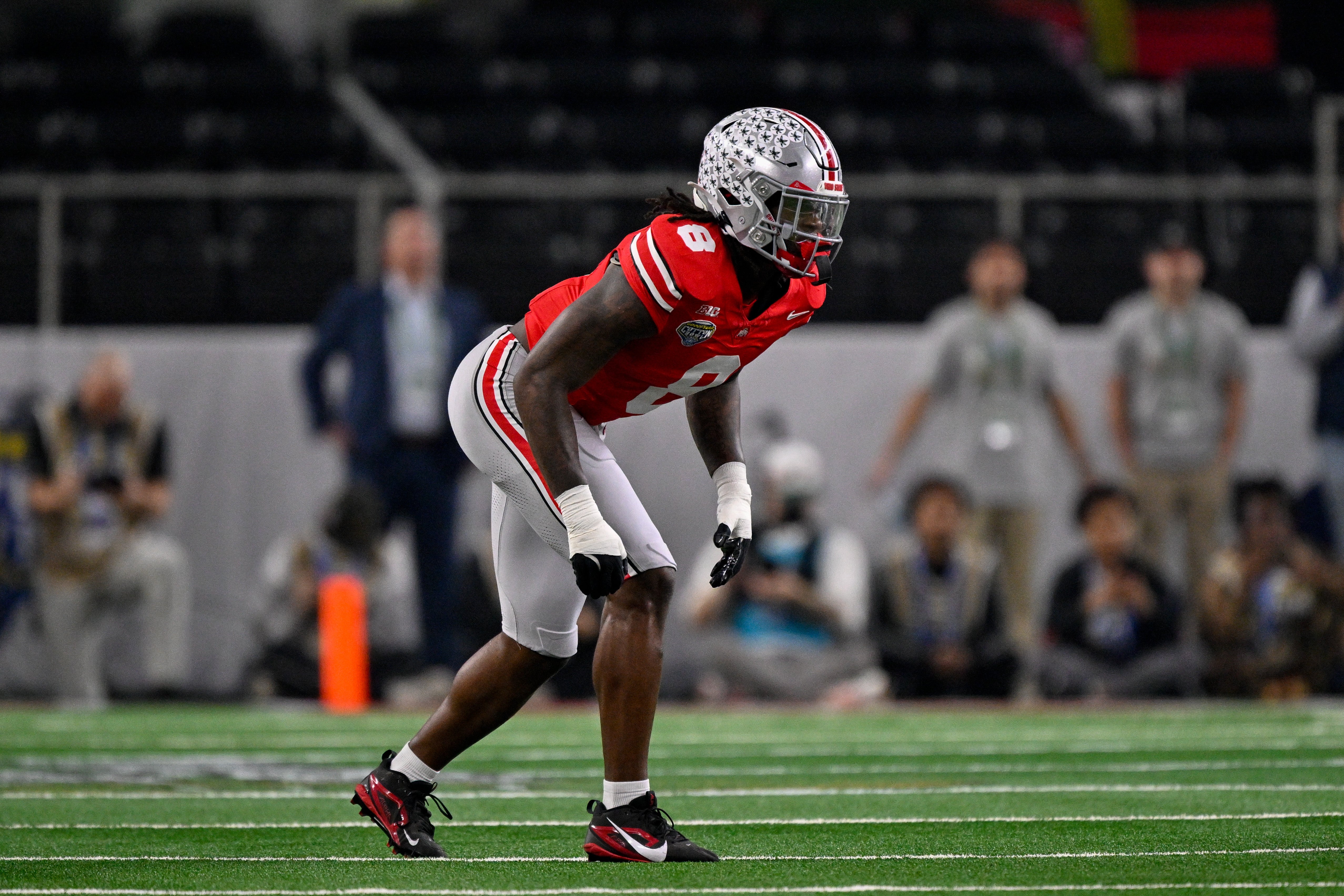 Dec 31, 2025; Arlington, TX, USA; Ohio State Buckeyes linebacker Arvell Reese (8) gets into position during the 2025 Cotton Bowl and quarterfinal game of the College Football Playoff at AT&T Stadium.