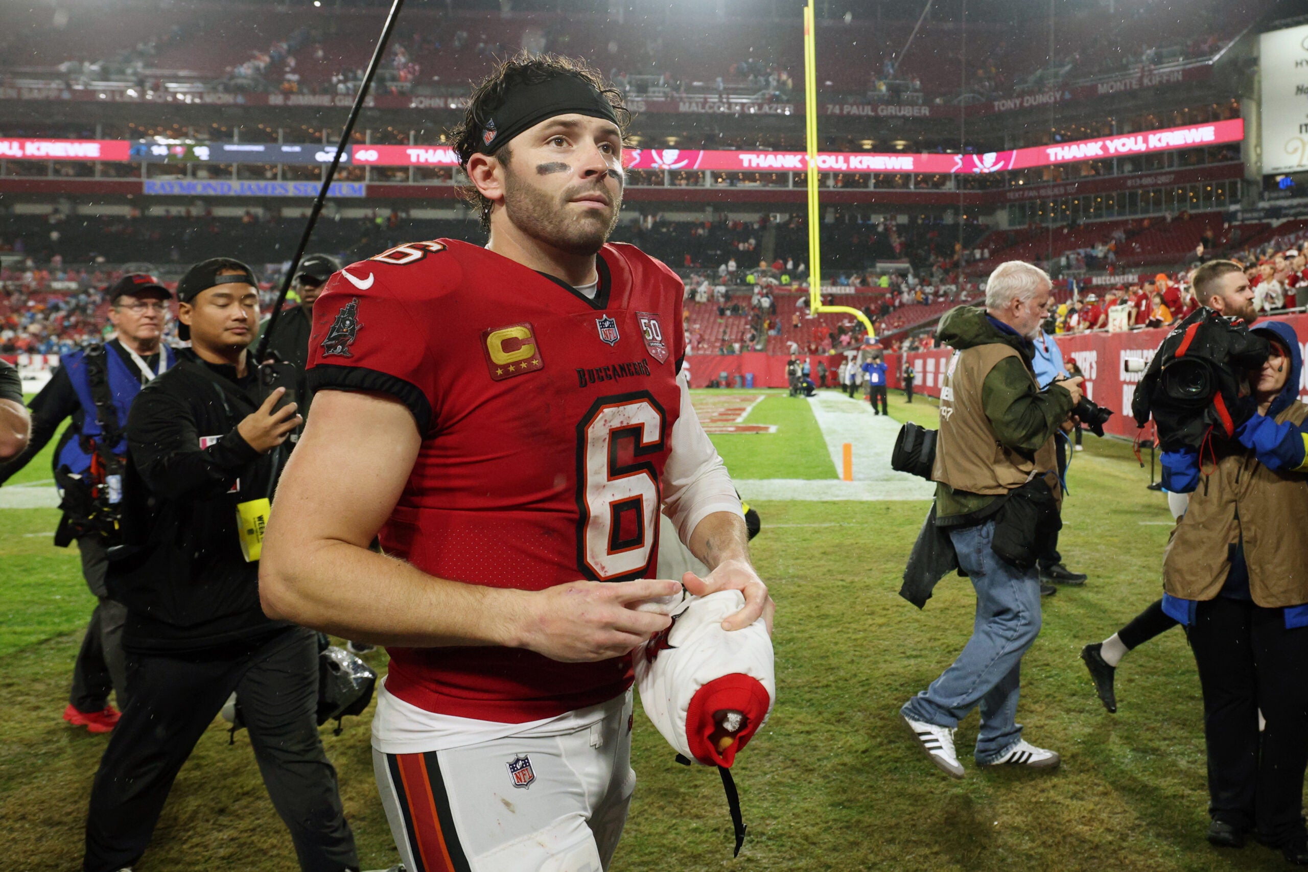Jan 3, 2026; Tampa, Florida, USA; Tampa Bay Buccaneers quarterback Baker Mayfield (6) leaves the field after defeating the Carolina Panthers at Raymond James Stadium.