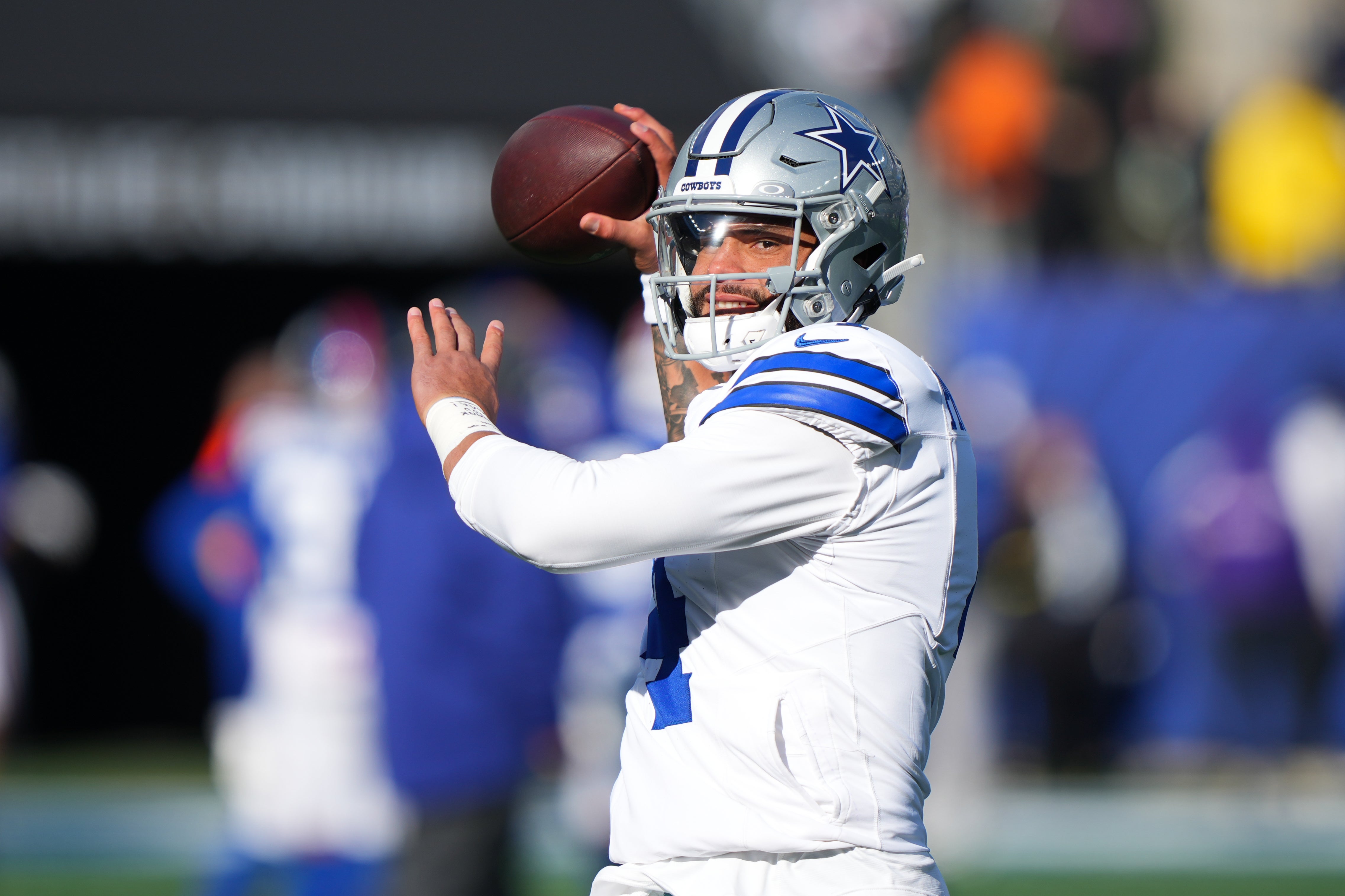 Jan 4, 2026; East Rutherford, New Jersey, USA; Dallas Cowboys quarterback Dak Prescott (4) warms up before the game against the New York Giants at MetLife Stadium.