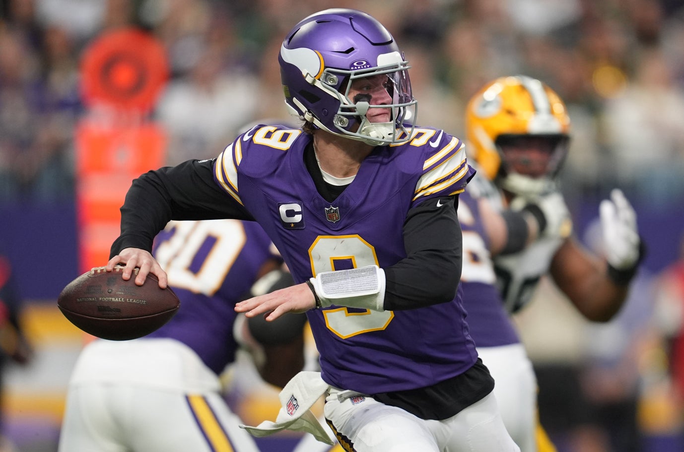 Jan 4, 2026; Minneapolis, Minnesota, USA; Minnesota Vikings quarterback J.J. McCarthy (9) throws a pass against the Green Bay Packers during the second quarter at U.S. Bank Stadium.