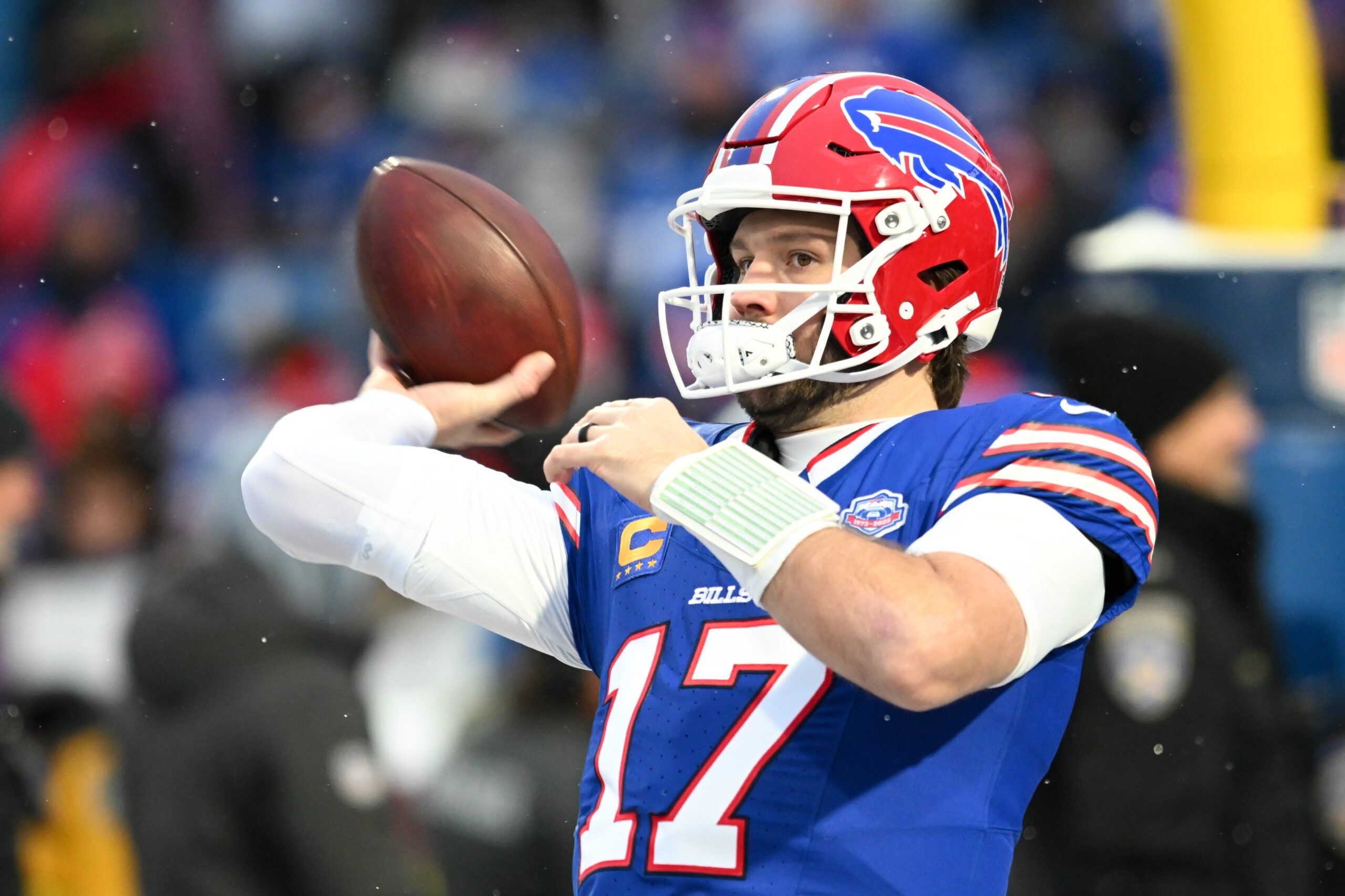 Jan 4, 2026; Orchard Park, New York, USA; Buffalo Bills quarterback Josh Allen (17) warms up before the game against the New York Jets at Highmark Stadium.