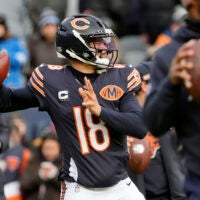 Jan 4, 2026; Chicago, Illinois, USA; Chicago Bears quarterback Caleb Williams (18) warms up before the game between the Chicago Bears and the Detroit Lions at Soldier Field.