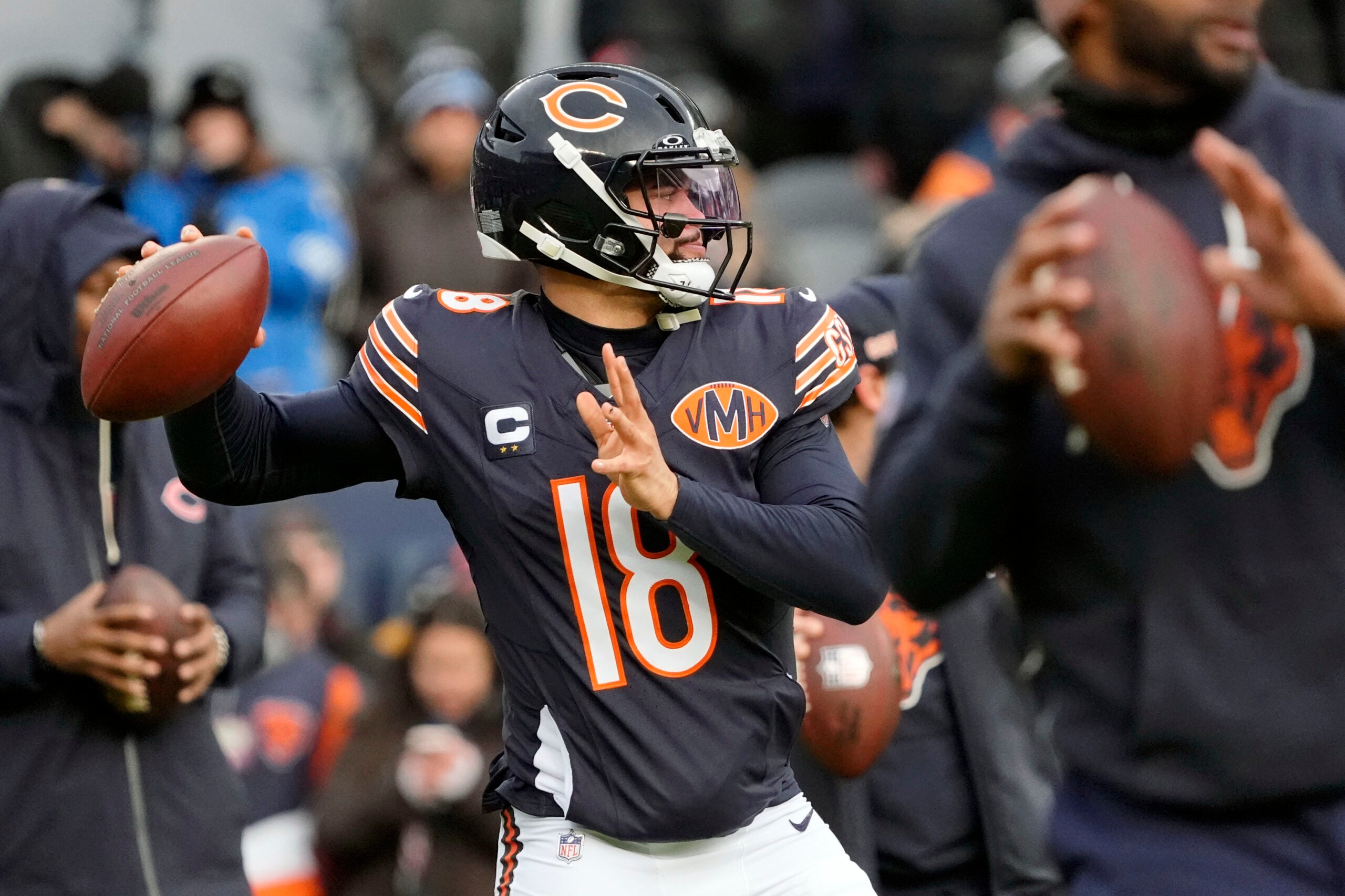 Jan 4, 2026; Chicago, Illinois, USA; Chicago Bears quarterback Caleb Williams (18) warms up before the game between the Chicago Bears and the Detroit Lions at Soldier Field.