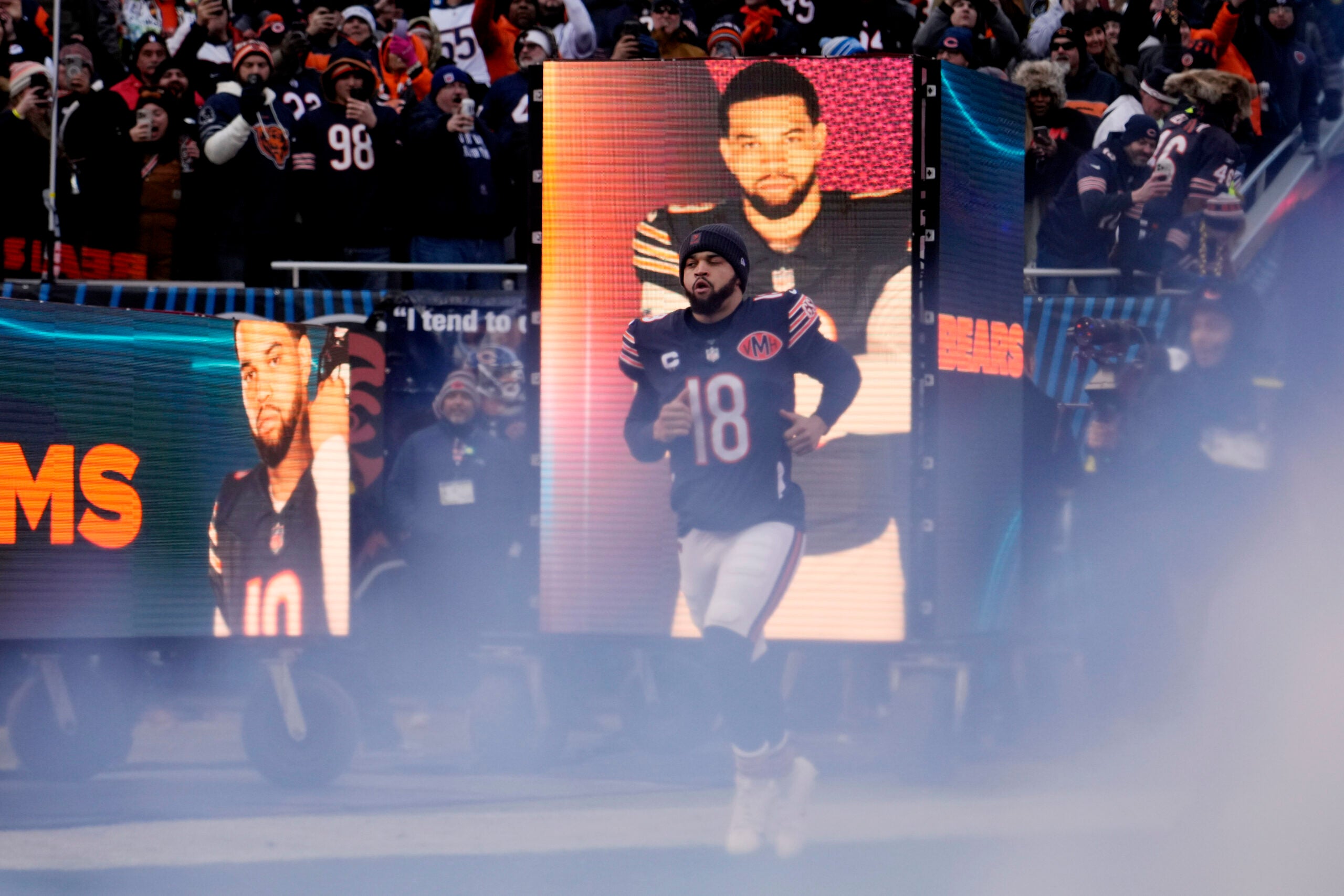Jan 4, 2026; Chicago, Illinois, USA; Chicago Bears quarterback Caleb Williams (18) runs onto the field before the game between the Chicago Bears and the Detroit Lions at Soldier Field.