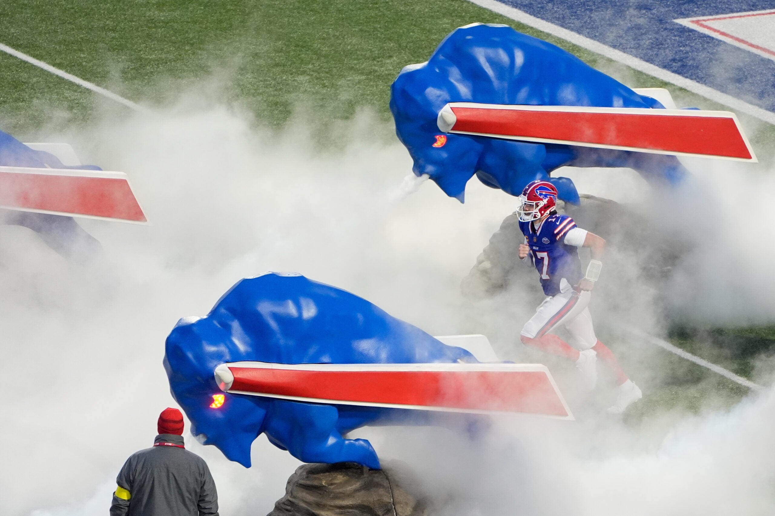 Jan 4, 2026; Orchard Park, New York, USA; Buffalo Bills quarterback Josh Allen (17) runs onto the field before the game against the New York Jets at Highmark Stadium.