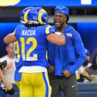 Jan 4, 2026; Inglewood, California, USA; Los Angeles Rams wide receiver Puka Nacua (12) reacts after scoring a touchdown with wide receiver Davante Adams during the first half against the Arizona Cardinals at SoFi Stadium.