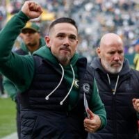 Green Bay Packers head coach Matt LaFleur pumps his fist as he runs off the field after defeating the Minnesota Vikings on Sunday, November 23, 2025, at Lambeau Field in Green Bay, Wis. The Packers won the game, 23-6.