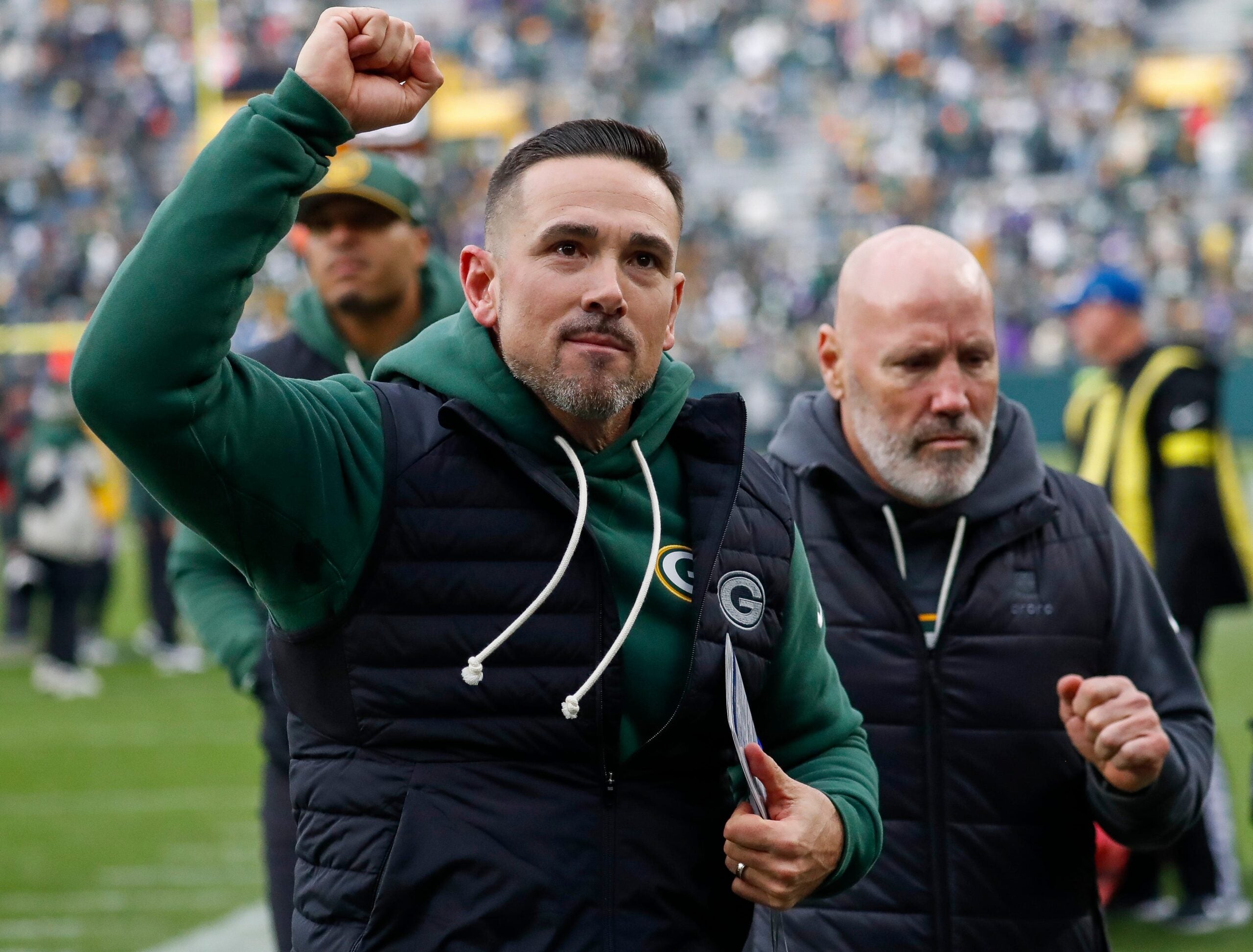 Green Bay Packers head coach Matt LaFleur pumps his fist as he runs off the field after defeating the Minnesota Vikings on Sunday, November 23, 2025, at Lambeau Field in Green Bay, Wis. The Packers won the game, 23-6.