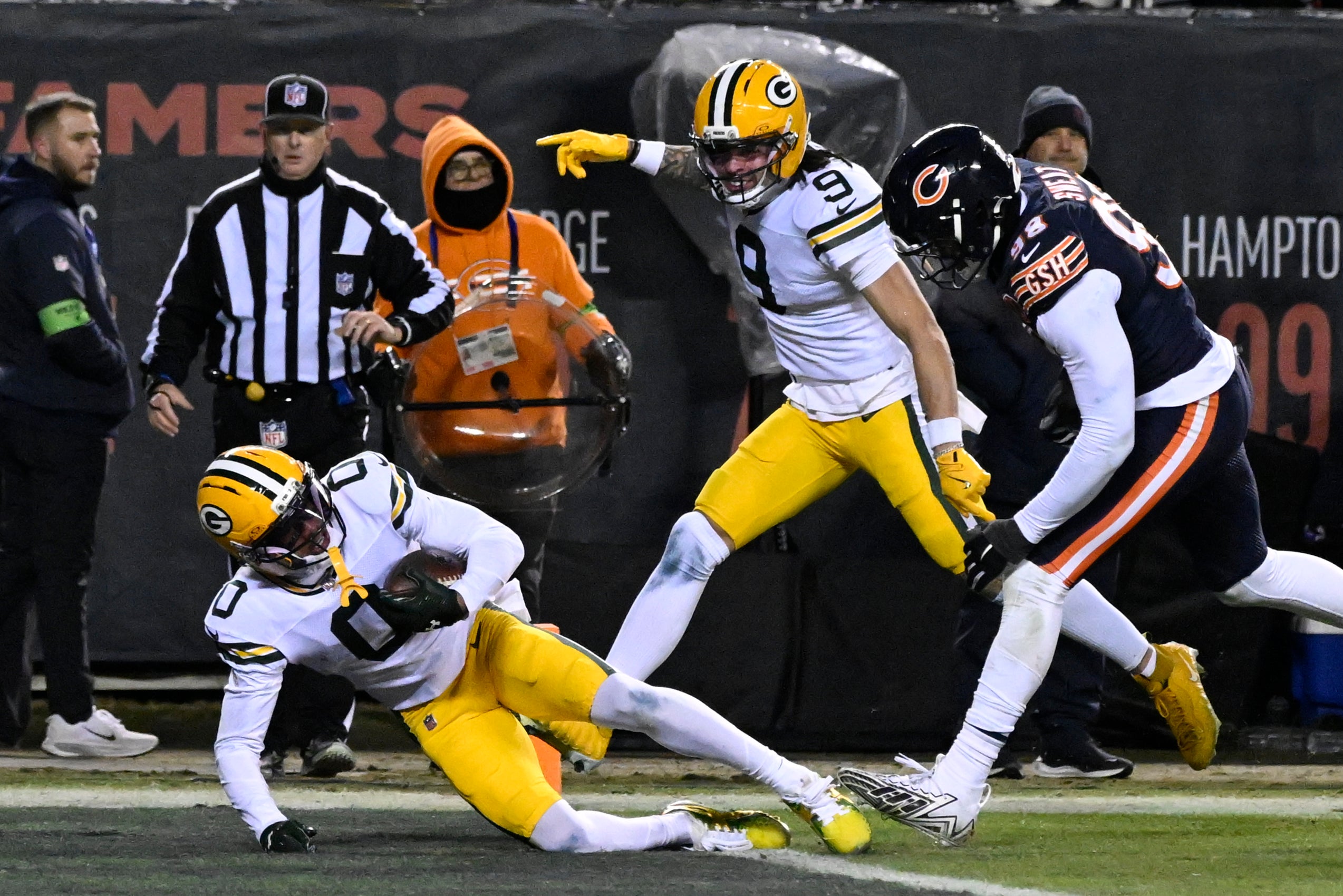 Jan 10, 2026; Chicago, IL, USA; Green Bay Packers wide receiver Matthew Golden (0) scores a touchdown against the Chicago Bears during the second half of an NFC Wild Card Round game at Soldier Field.