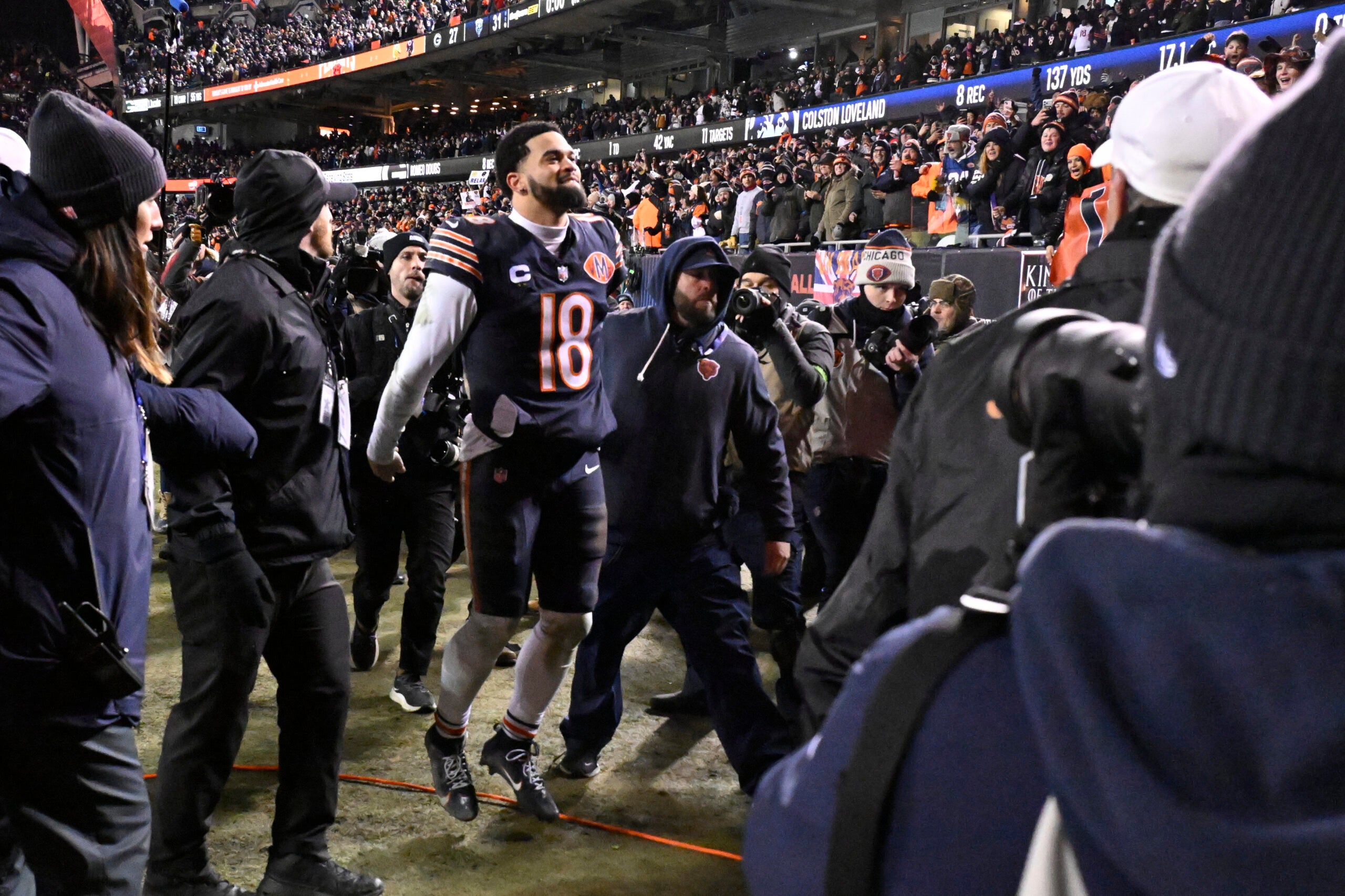 Jan 10, 2026; Chicago, IL, USA; Chicago Bears quarterback Caleb Williams (18) leaves the field following a game against the Green Bay Packers in an NFC Wild Card Round game at Soldier Field.