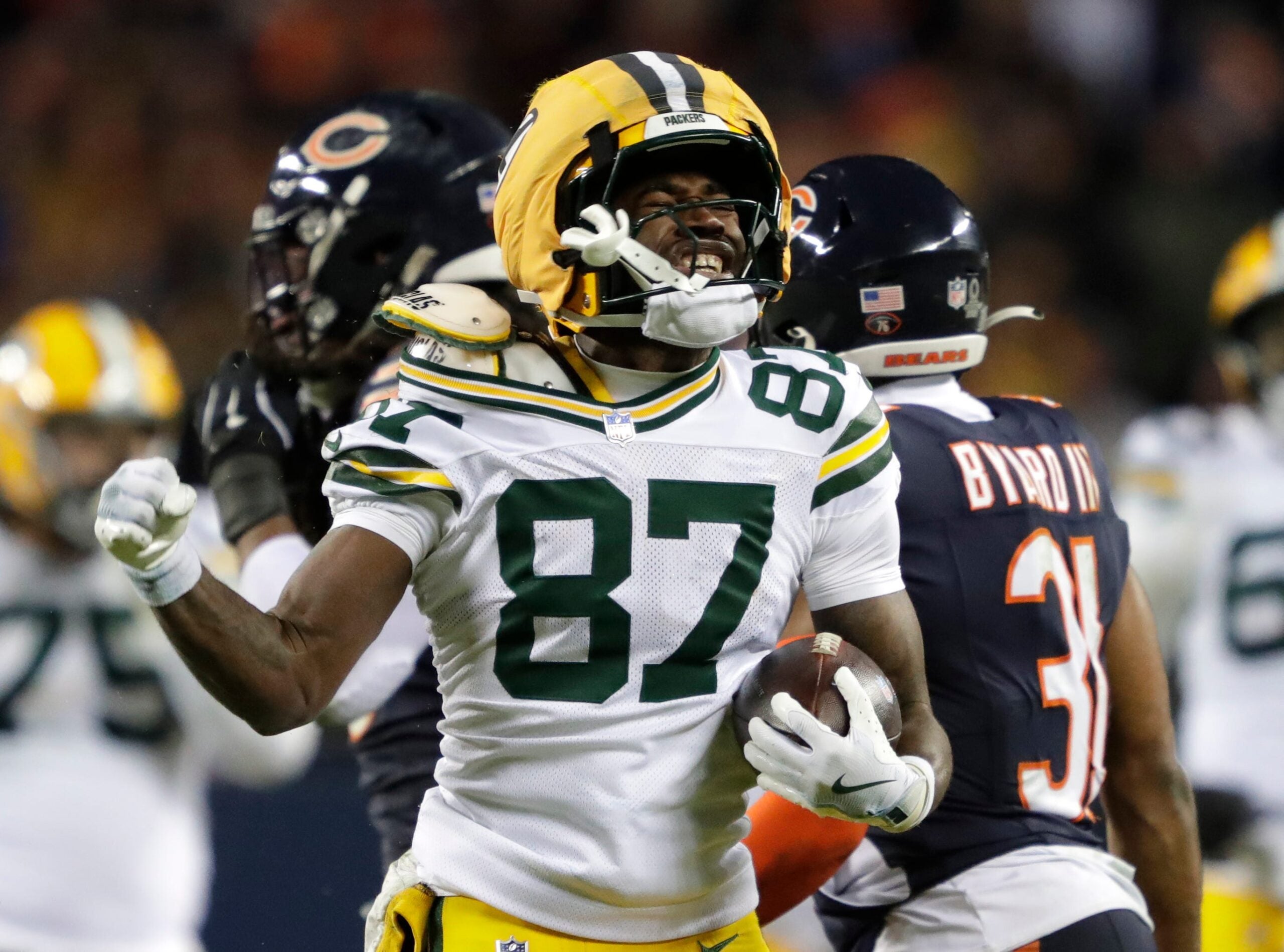 Green Bay Packers wide receiver Romeo Doubs (87) celebrates a first down reception against the Chicago Bears in the fourth quarter during their wild-card playoff football game Saturday, January 10, 2026, at Soldier Field in Chicago, Illinois.