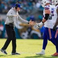 Buffalo Bills head coach Sean McDermott high-fives teammates during the fourth quarter of an NFL football AFC Wild Card playoff matchup, Sunday, Jan. 11, 2026, in Jacksonville, Fla. The Bills defeated the Jaguars 27-24.