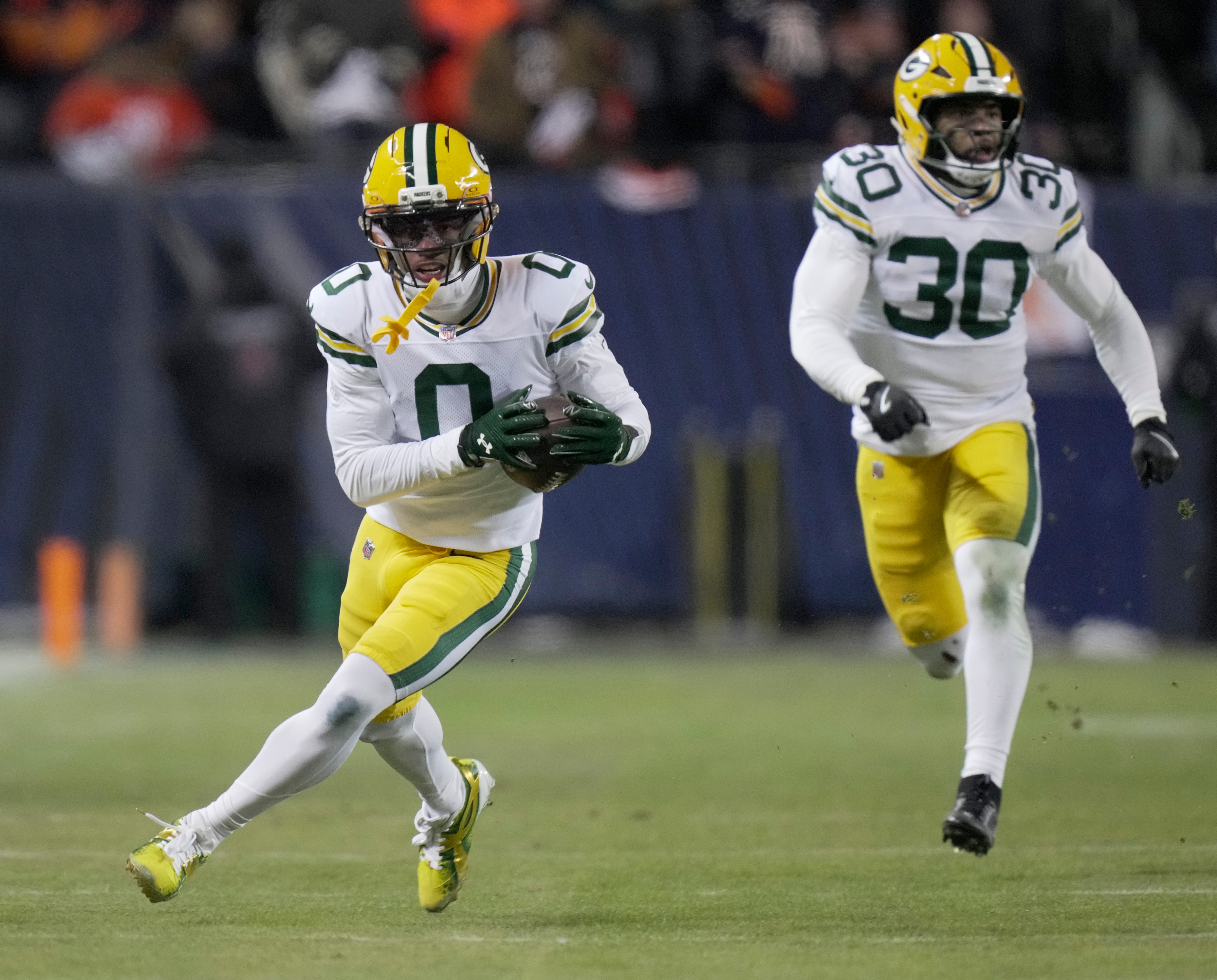 Green Bay Packers wide receiver Matthew Golden (0) makes a reception for a first down during the second quarter of their wild card playoff game against the Chicago Bears Saturday, January 10, 2026 at Soldier Field in Chicago, Illinois.