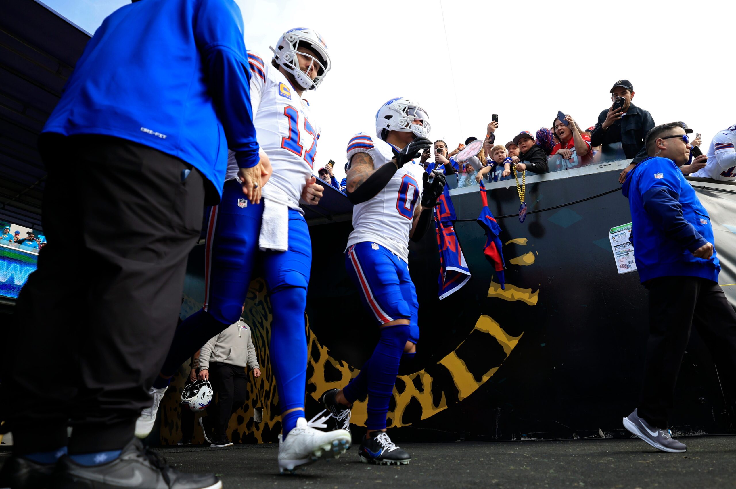 Buffalo Bills quarterback Josh Allen (17) and wide receiver Keon Coleman (0) run on the field before an NFL football AFC Wild Card playoff matchup, Sunday, Jan. 11, 2026, in Jacksonville, Fla. The Bills defeated the Jaguars 27-24.