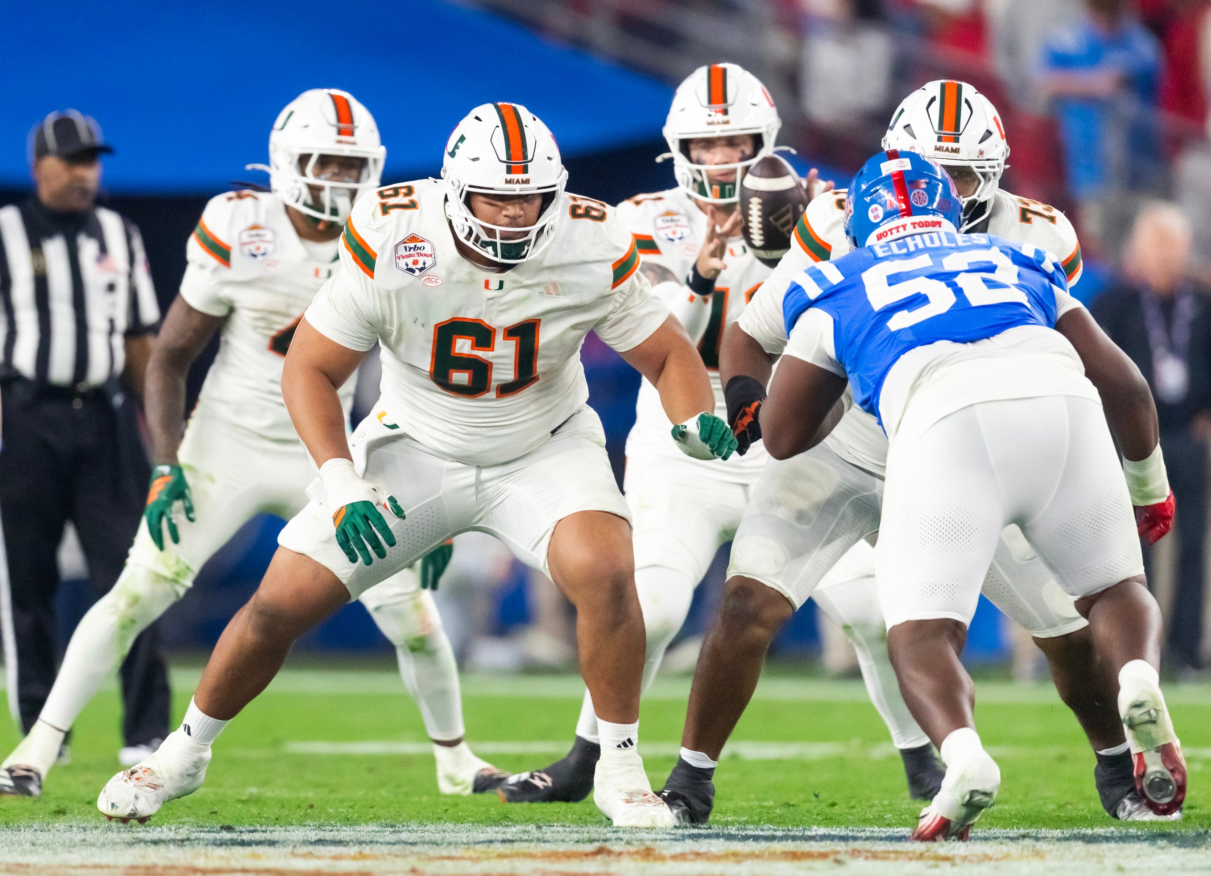 Jan 8, 2026; Glendale, AZ, USA; Miami Hurricanes offensive lineman Francis Mauigoa (61) against the Mississippi Rebels during the 2026 Fiesta Bowl and semifinal game of the College Football Playoff at State Farm Stadium.