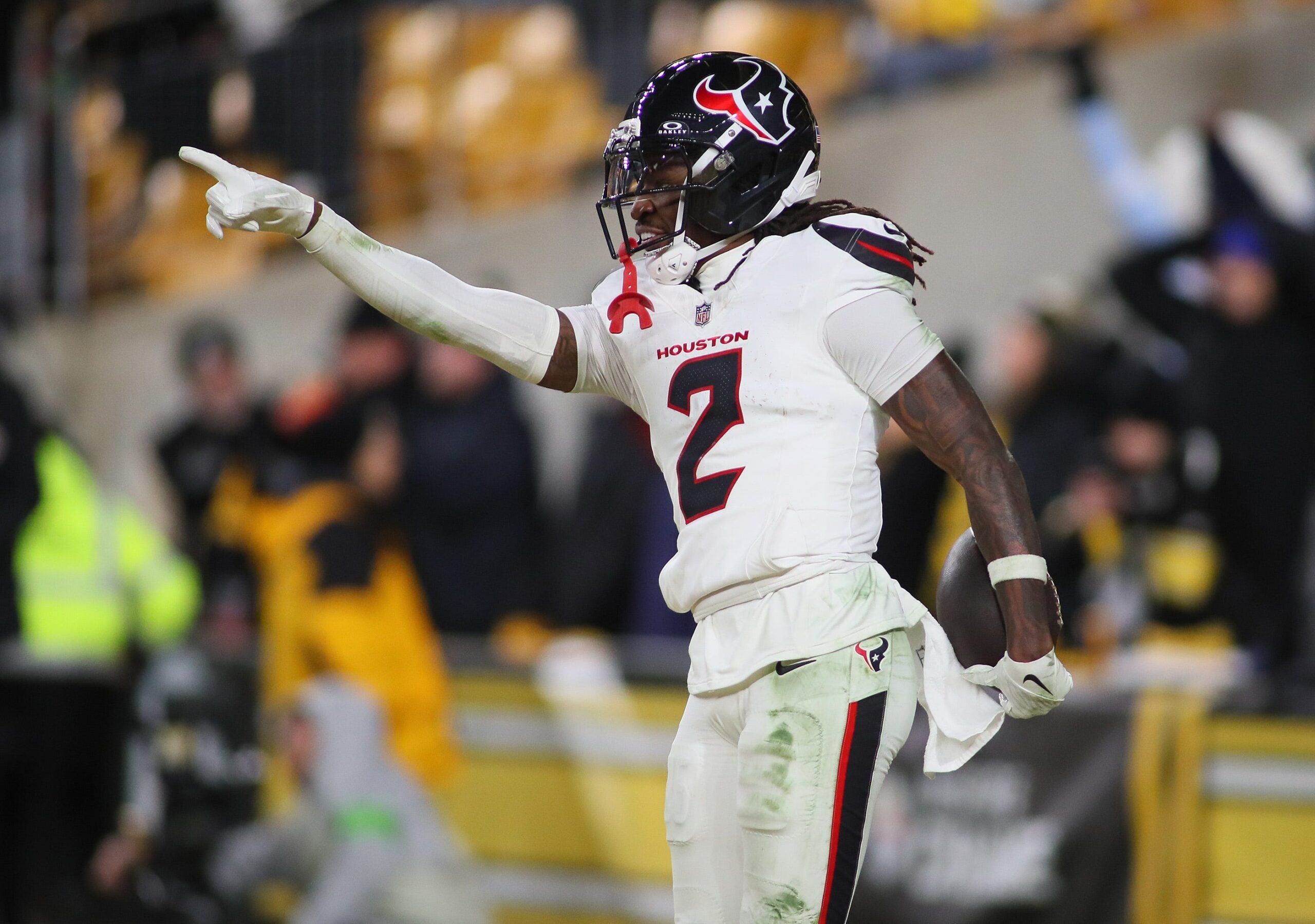 Houston Texans safety Calen Bullock (2) celebrates a touchdown during the second half of the NFL Wild Card game against the Pittsburgh Steelers at Acrisure Stadium in Pittsburgh, PA on January 12, 2026.