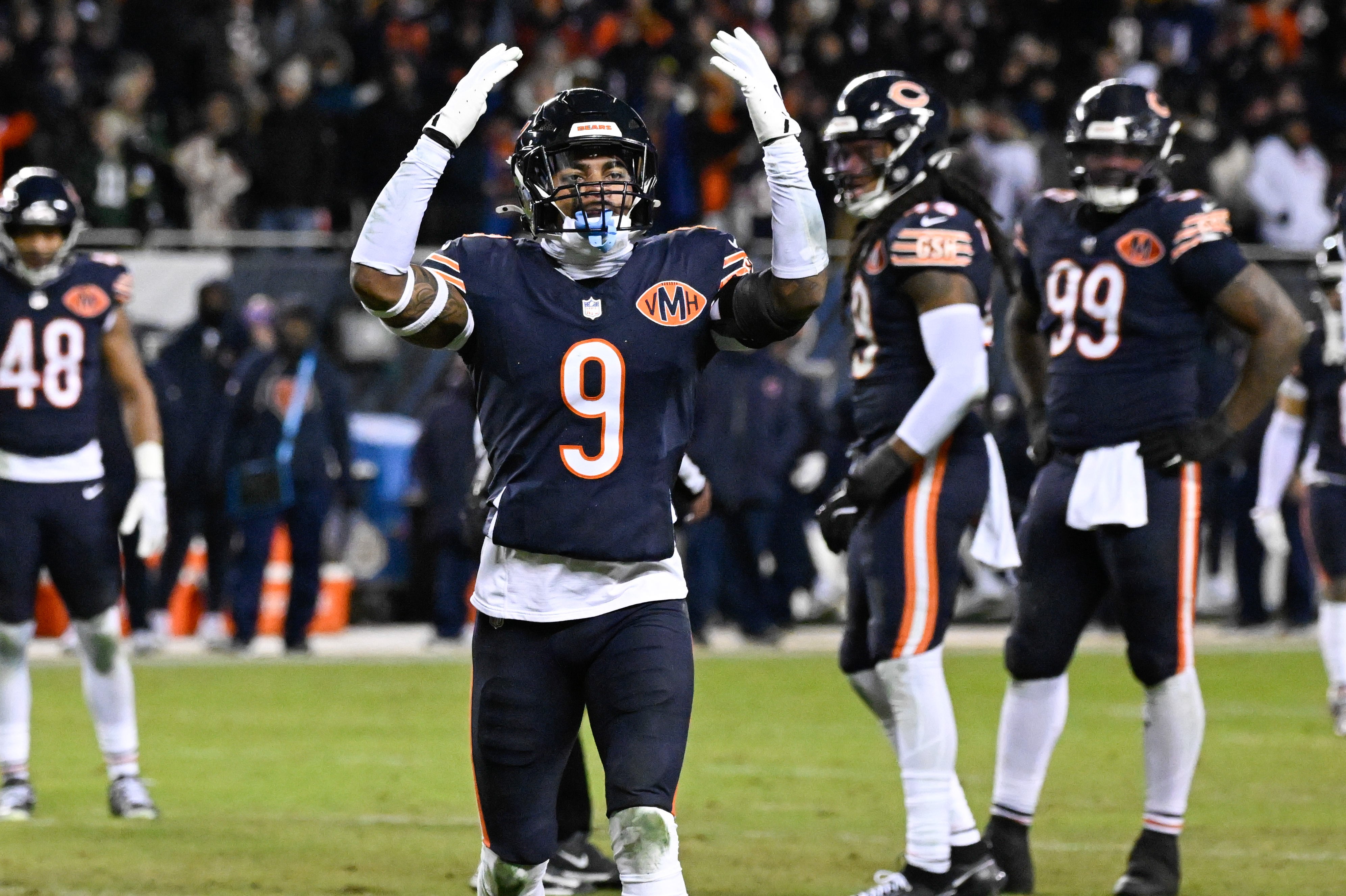 Jan 10, 2026; Chicago, IL, USA; Chicago Bears safety Jaquan Brisker (9) reacts after a flag against the Green Bay Packers during an NFC Wild Card Round game at Soldier Field.