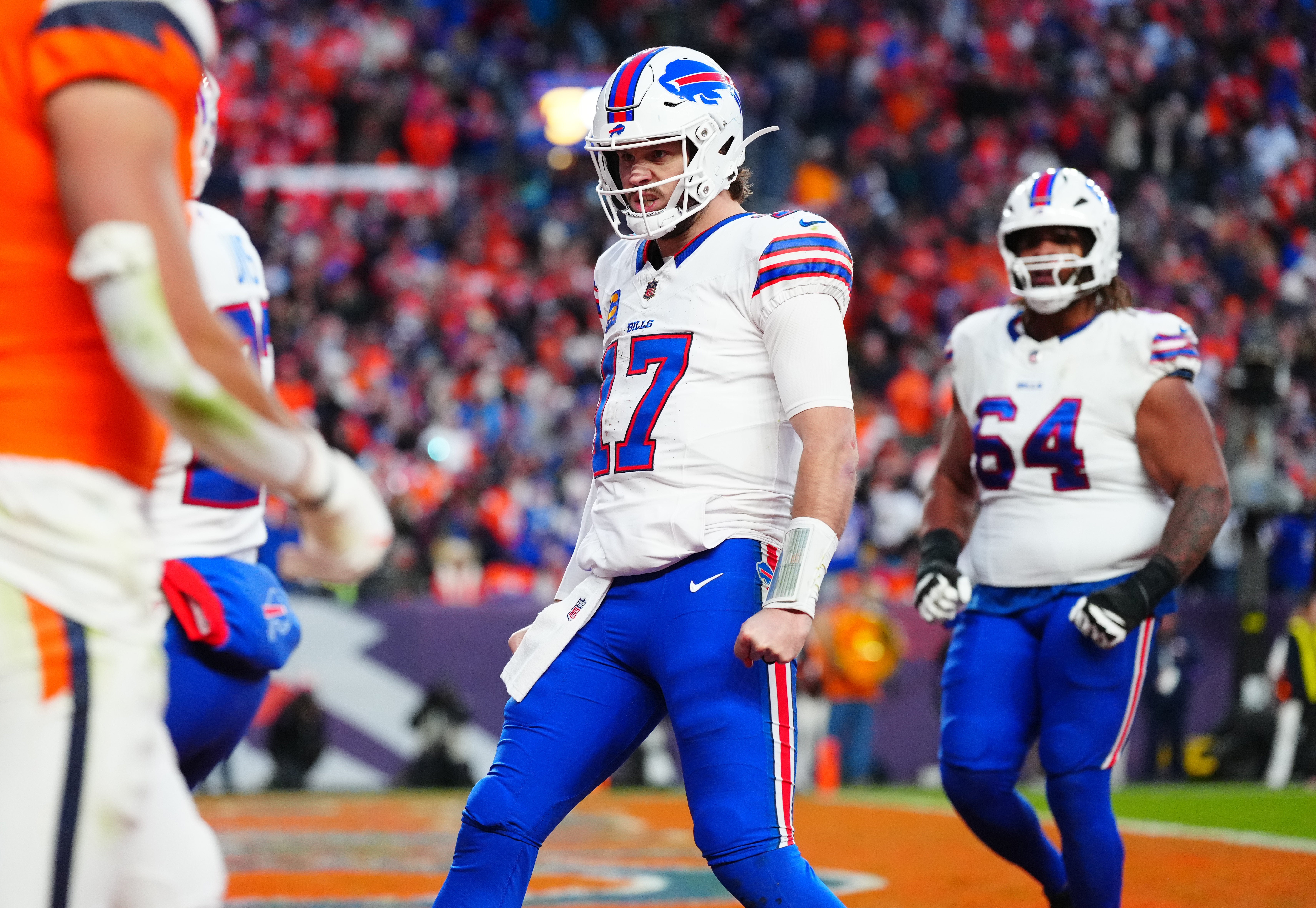Jan 17, 2026; Denver, CO, USA; Buffalo Bills quarterback Josh Allen (17) celebrates after a touchdown against the Denver Broncos during the fourth quarter of an AFC Divisional Round playoff game at Empower Field at Mile High.