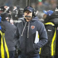 Jan 18, 2026; Chicago, IL, USA; Chicago Bears head coach Ben Johnson watches game play against the Los Angeles Rams during the second quarter of an NFC Divisional Round game at Soldier Field.