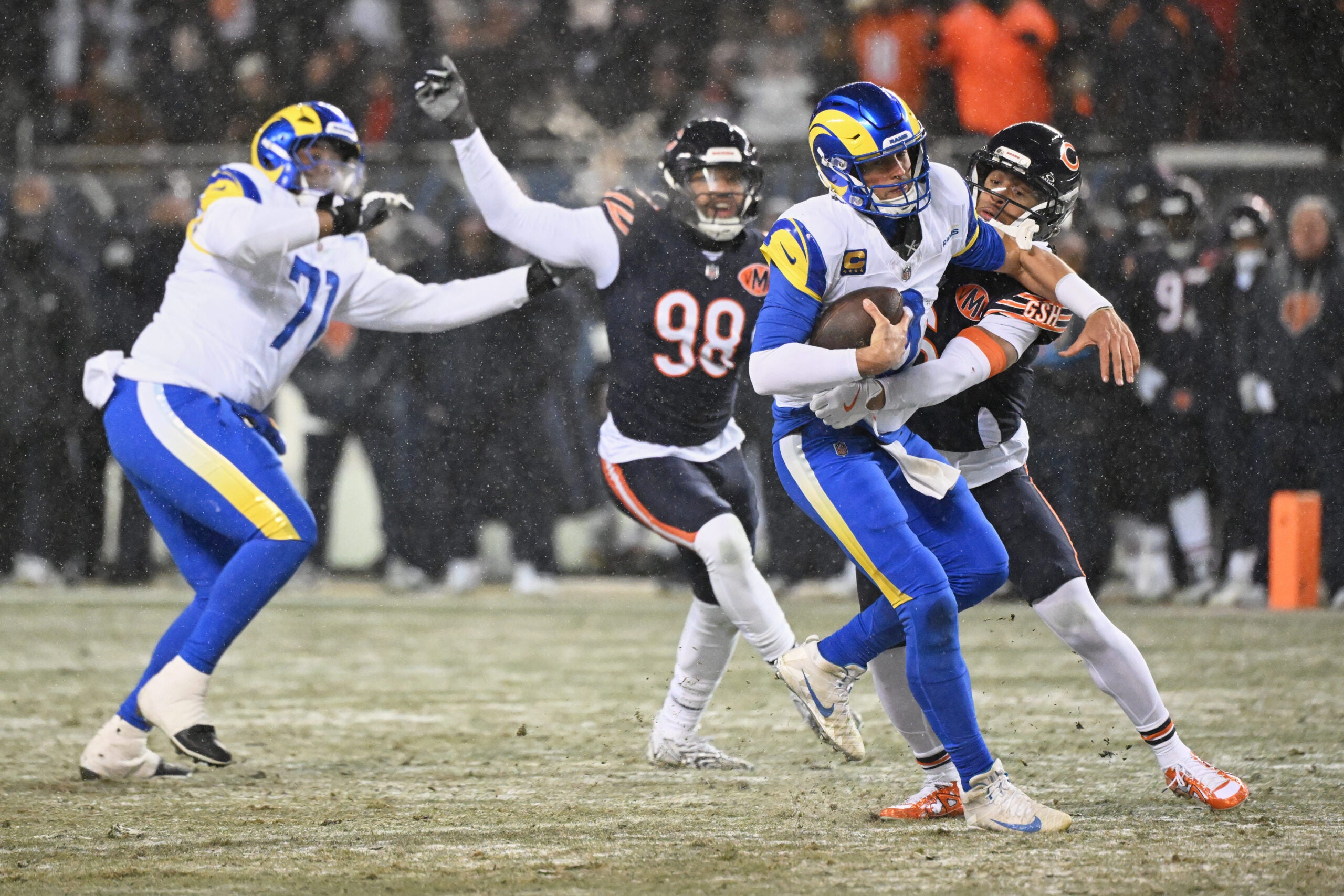 Jan 18, 2026; Chicago, IL, USA; Chicago Bears cornerback Kyler Gordon (6) sacks Los Angeles Rams quarterback Matthew Stafford (9) during the second quarter of an NFC Divisional Round game at Soldier Field.